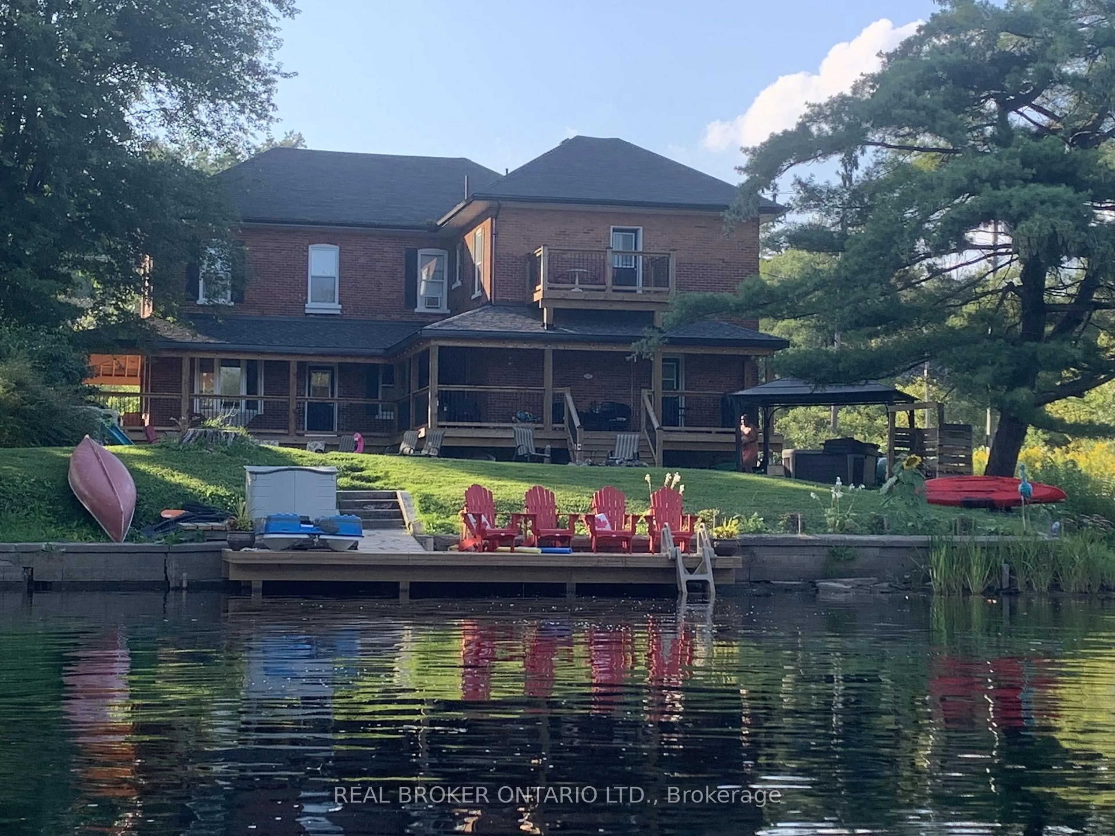 A pic from outside/outdoor area/front of a property/back of a property/a pic from drone, water/lake/river/ocean view for 1002 COWBELL Lane, Gravenhurst Ontario P0E 1N0