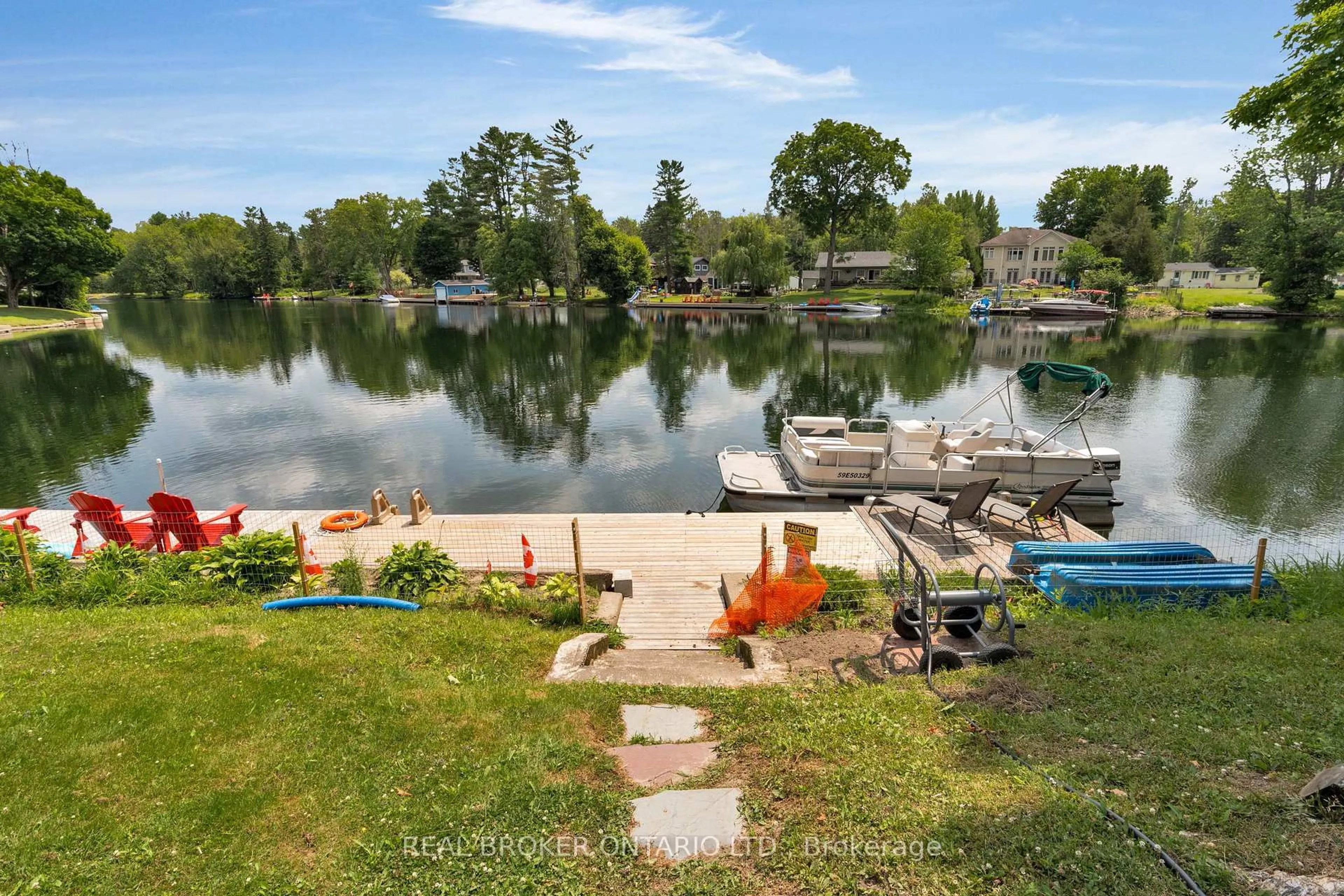 A pic from outside/outdoor area/front of a property/back of a property/a pic from drone, water/lake/river/ocean view for 1002 COWBELL Lane, Gravenhurst Ontario P0E 1N0