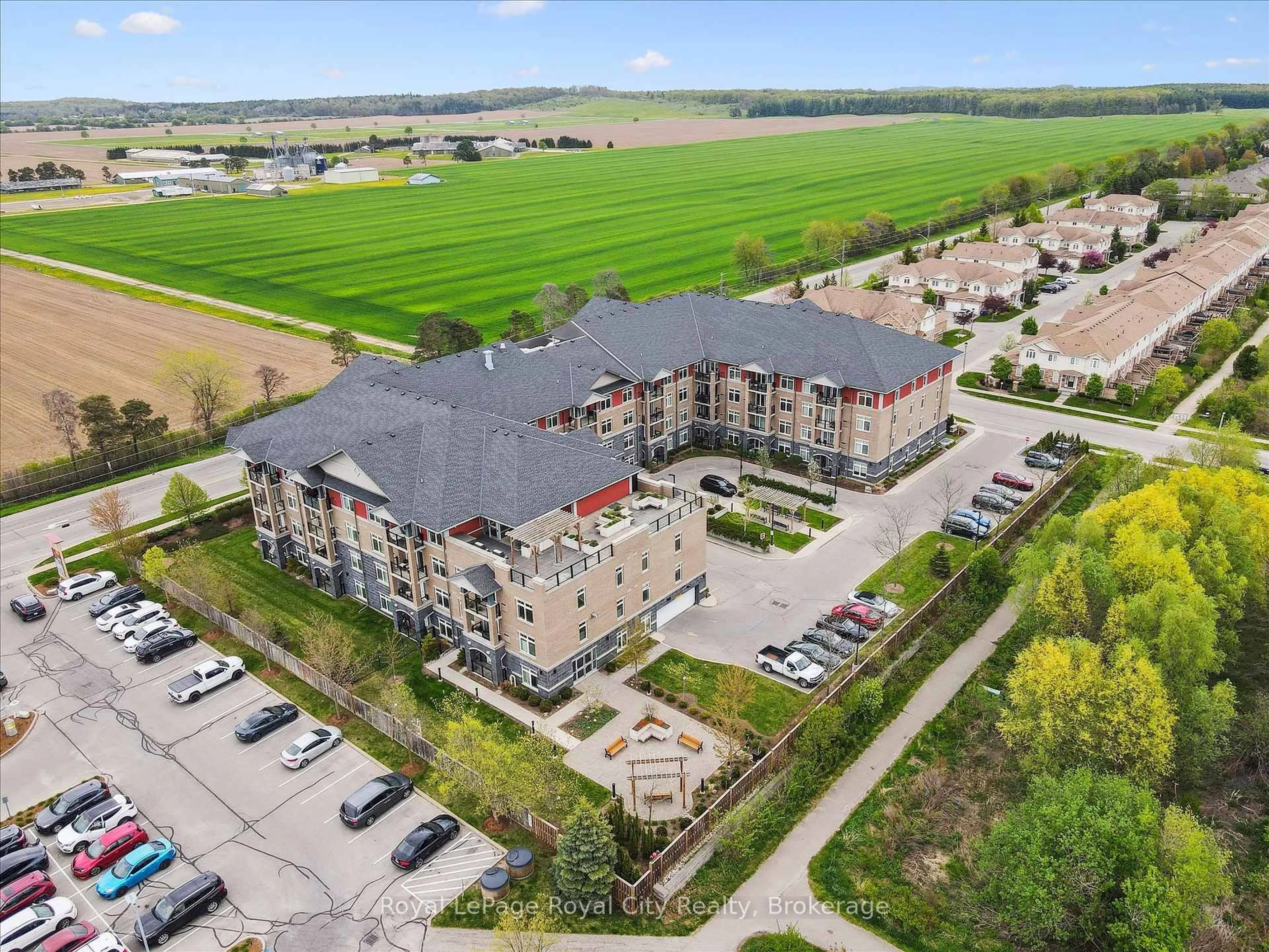 A pic from outside/outdoor area/front of a property/back of a property/a pic from drone, building for 106 Bard Blvd #202, Guelph Ontario N1L 0L8