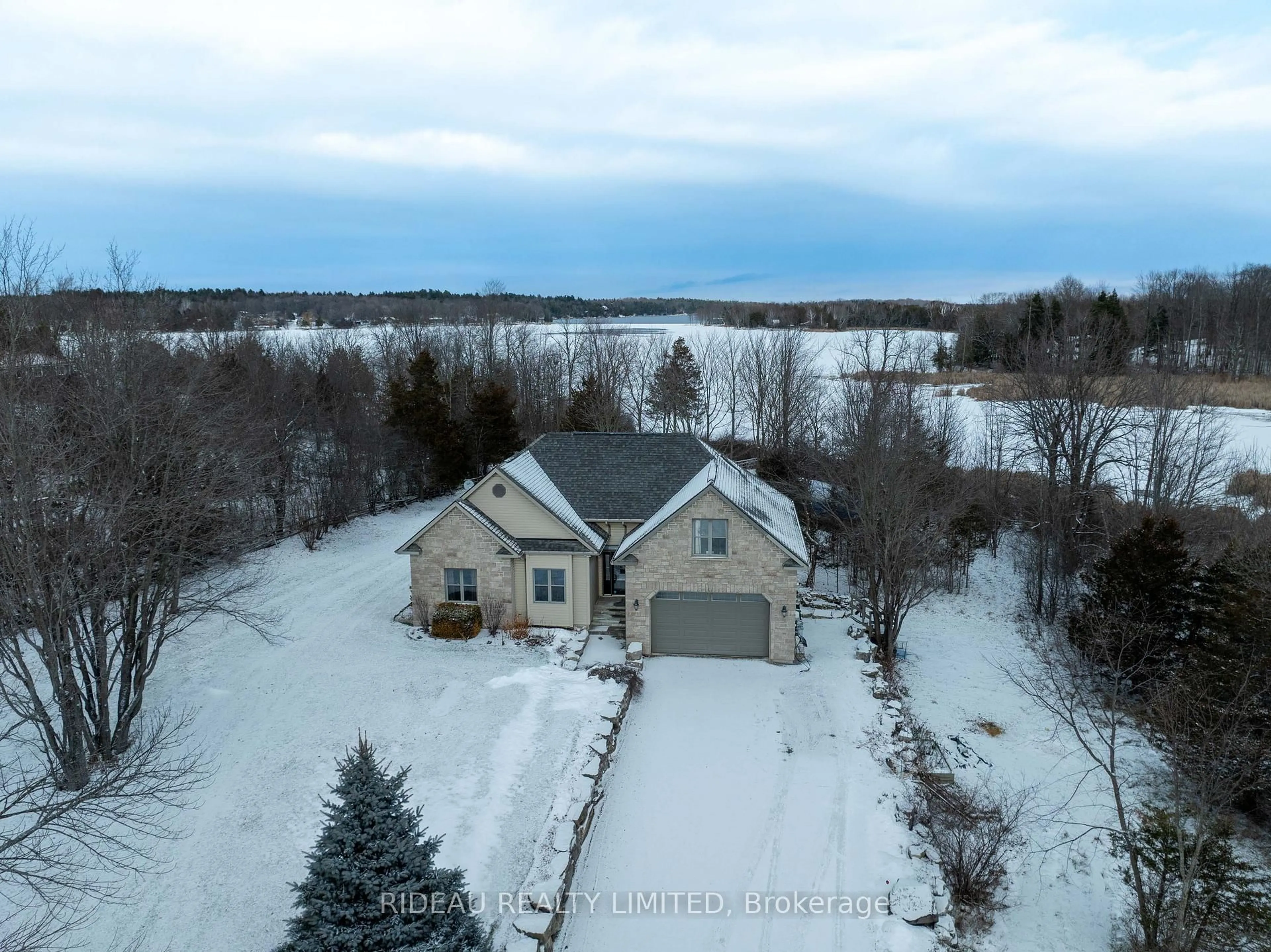 A pic from outside/outdoor area/front of a property/back of a property/a pic from drone, water/lake/river/ocean view for 25 MCNAMEE Lane, Rideau Lakes Ontario K0G 1V0