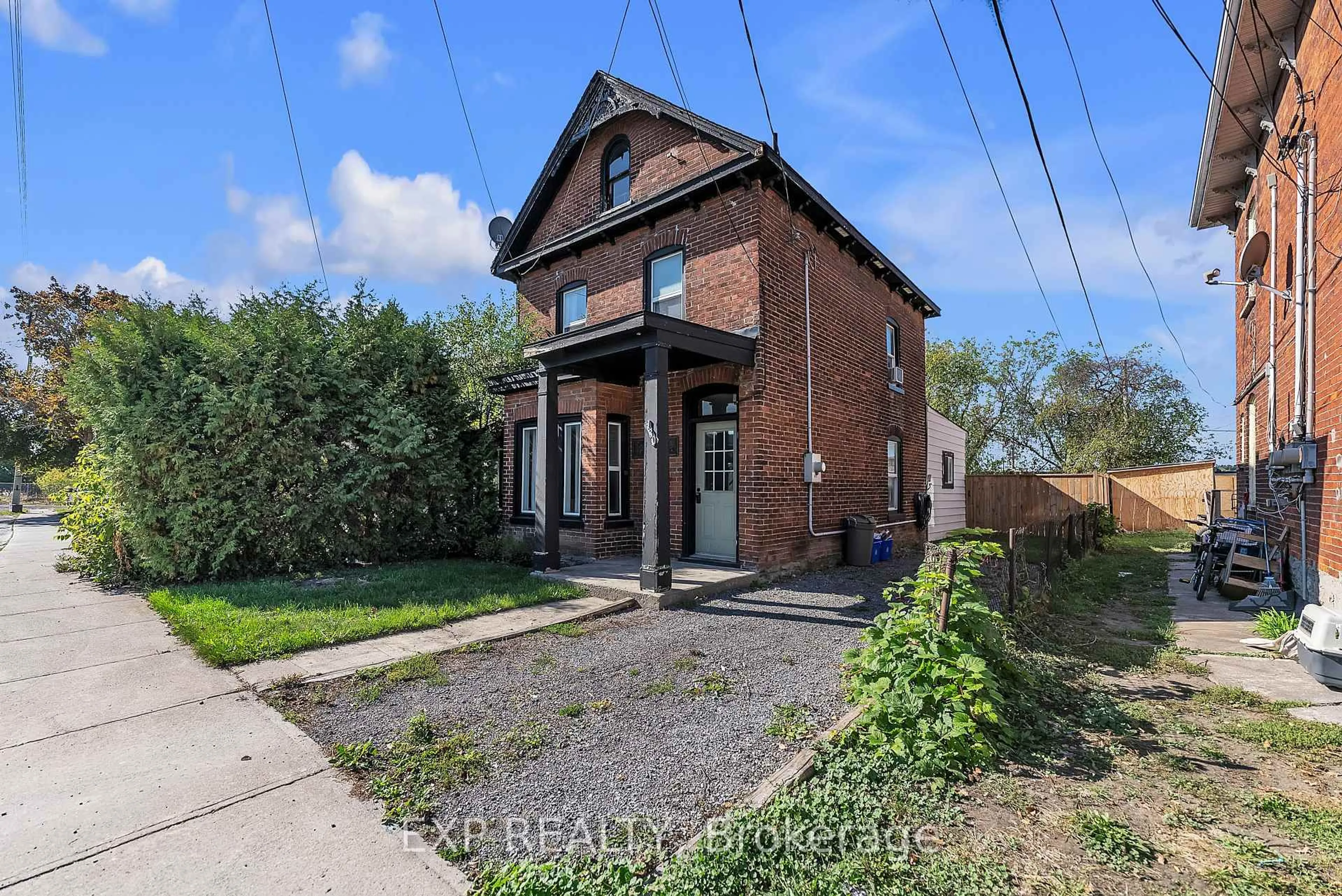 Home with brick exterior material, street for 130 John St, Belleville Ontario K8N 5J8
