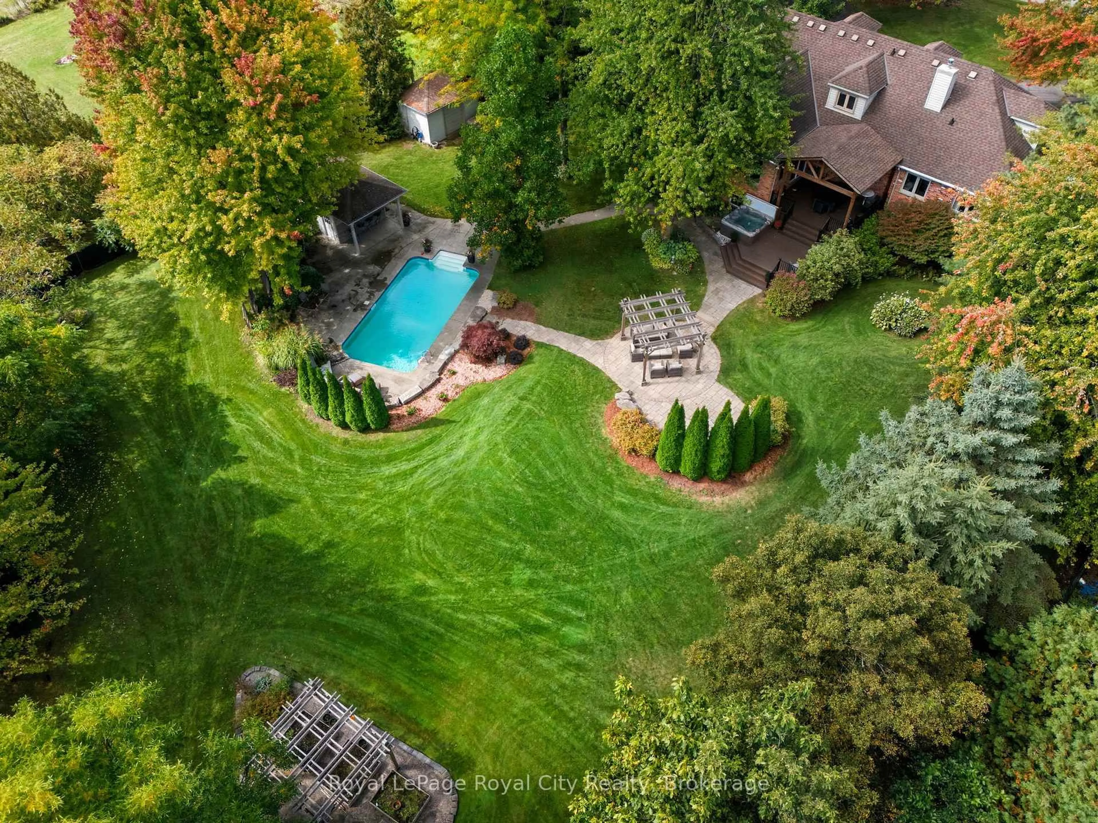 A pic from outside/outdoor area/front of a property/back of a property/a pic from drone, forest/trees view for 55 Bridle Path, Puslinch Ontario N0B 2J0