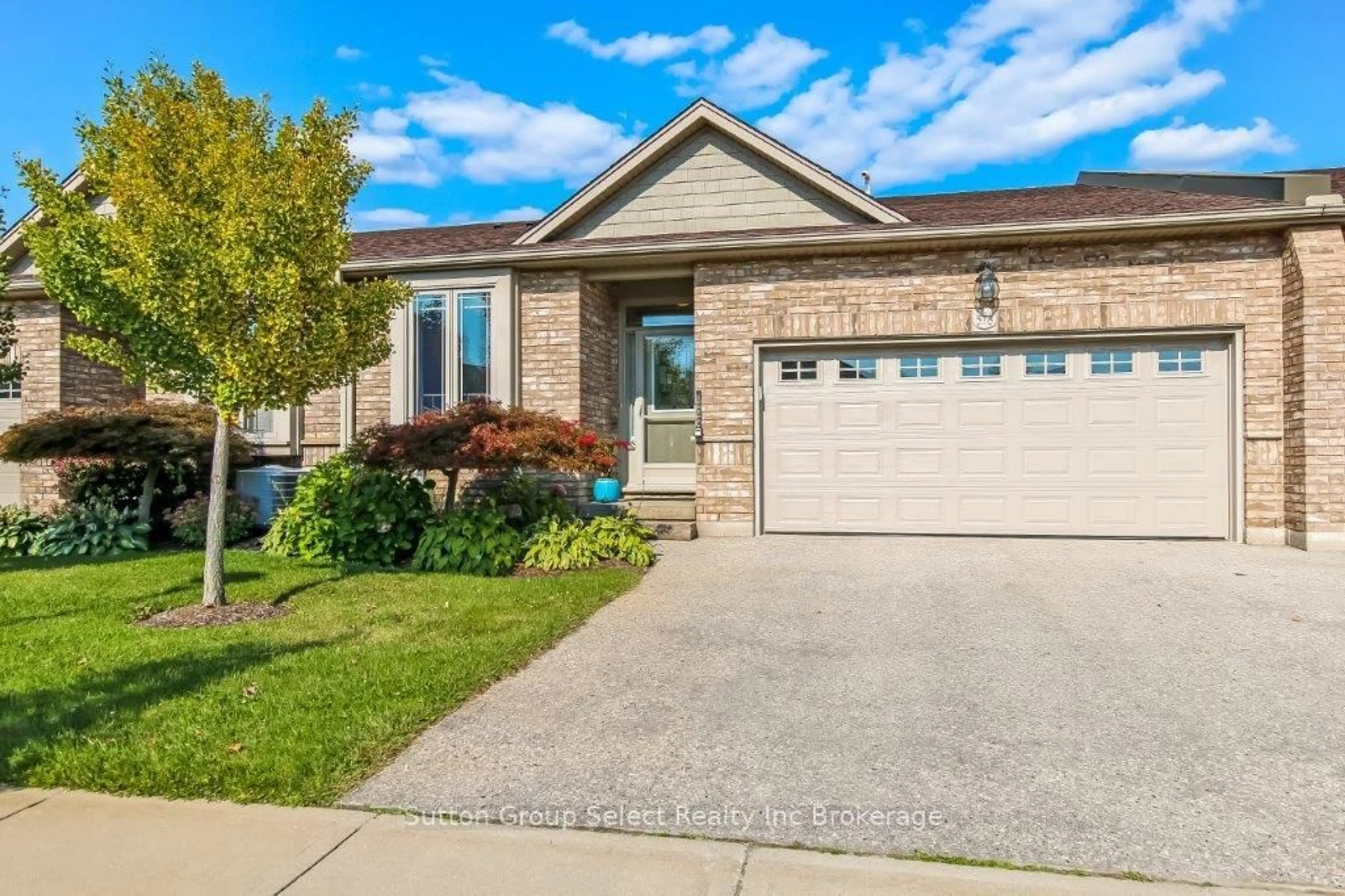 Home with brick exterior material, street for 578 Spitfire St #52, Woodstock Ontario N4T 0C2