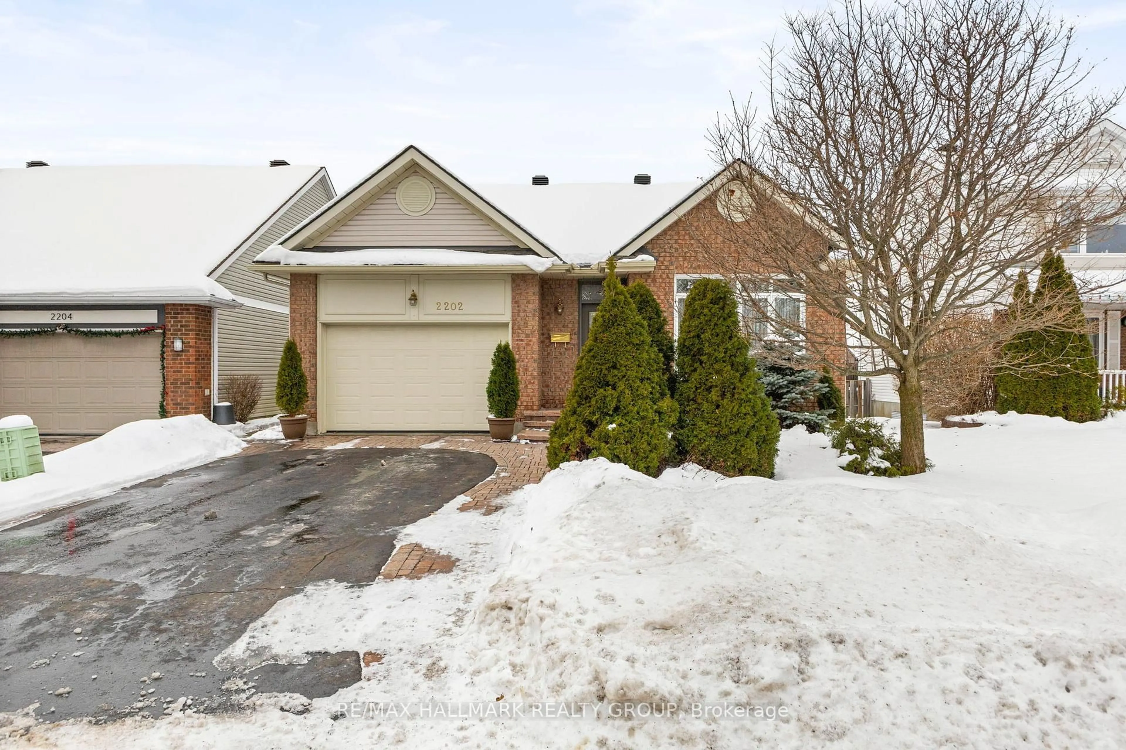 Home with brick exterior material, street for 2202 Nature Trail Cres, Ottawa Ontario K1W 1E6