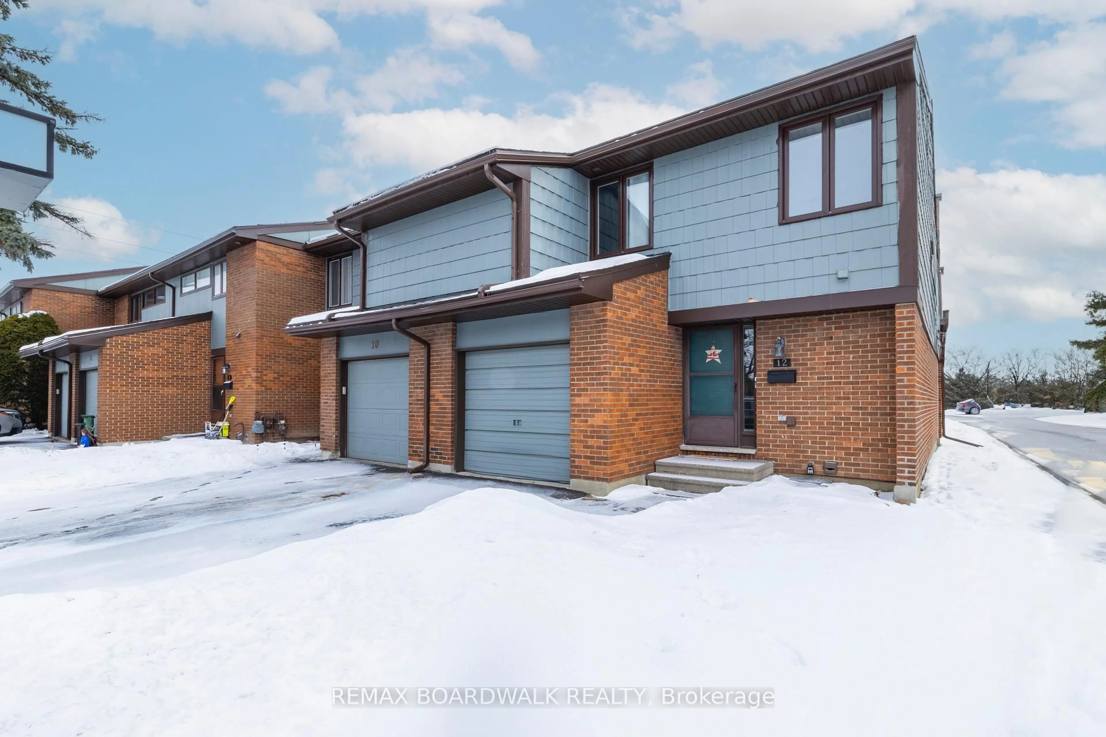 Home with brick exterior material, street for 12 Selye Cres, Ottawa Ontario K2K 1C9