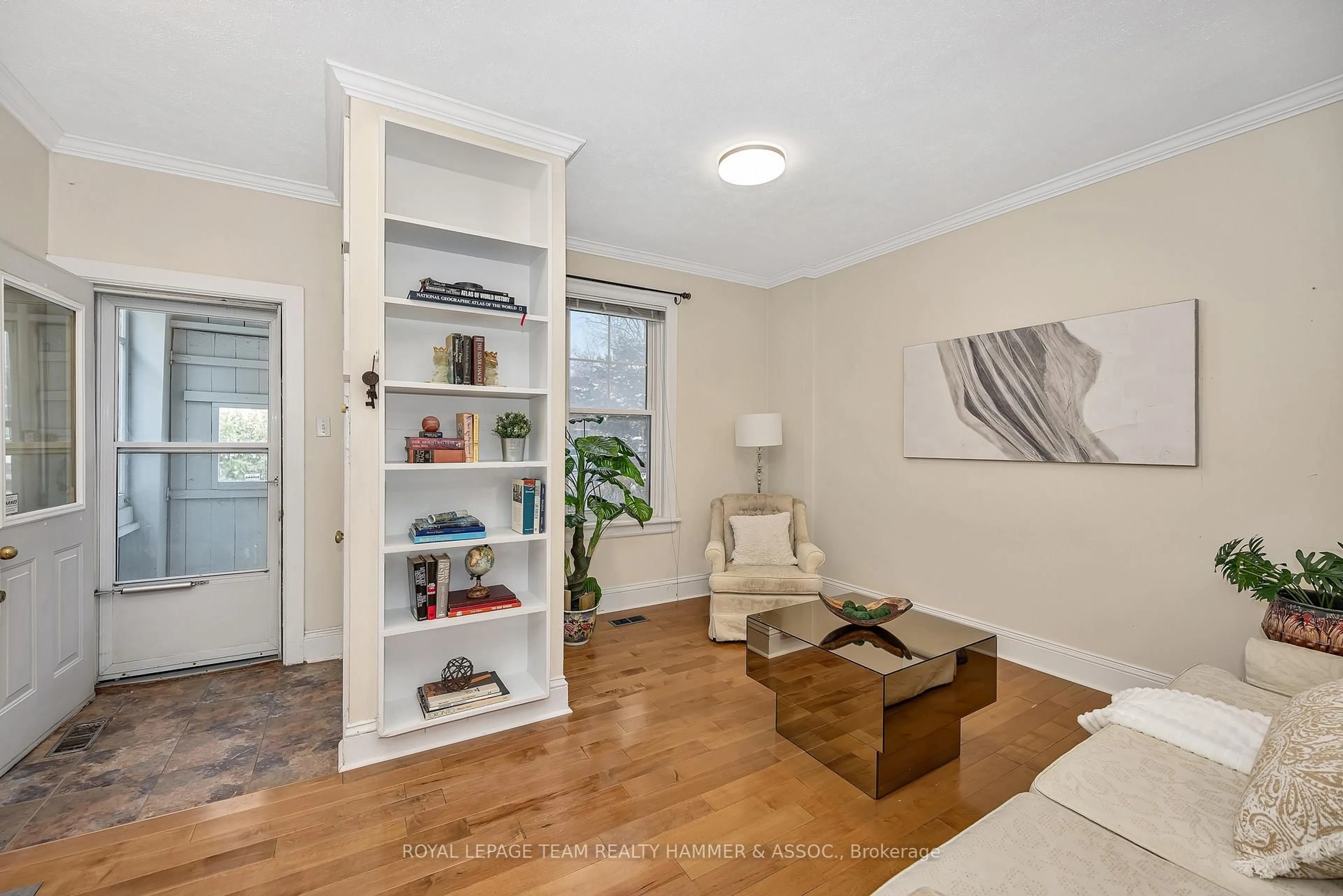 Living room with furniture, wood/laminate floor for 681 1/2 Cooper St, Ottawa Ontario K1R 5J3