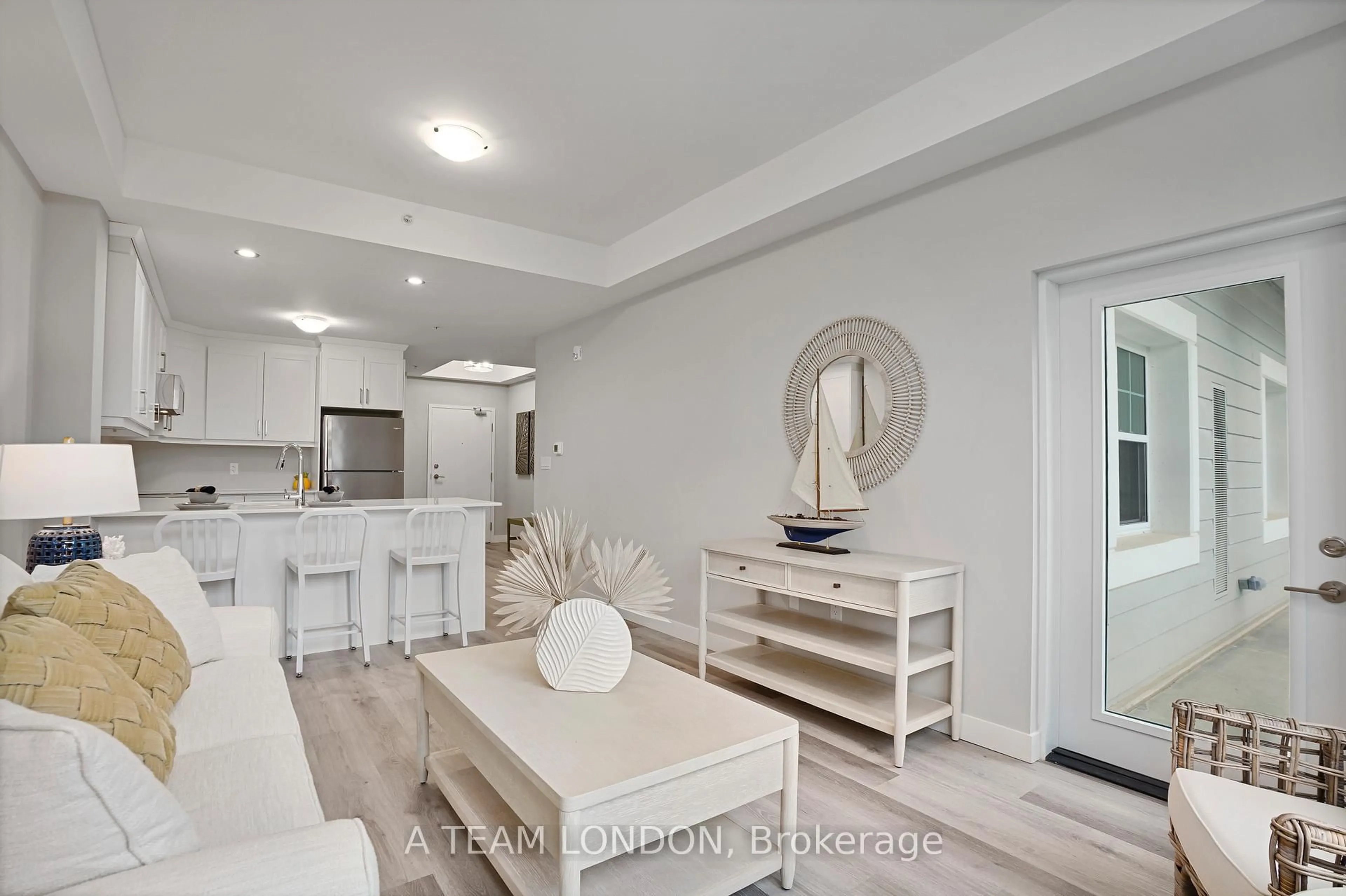 Living room with furniture, unknown for 100 THE PROMENADE #201, Central Elgin Ontario N5L 1C5