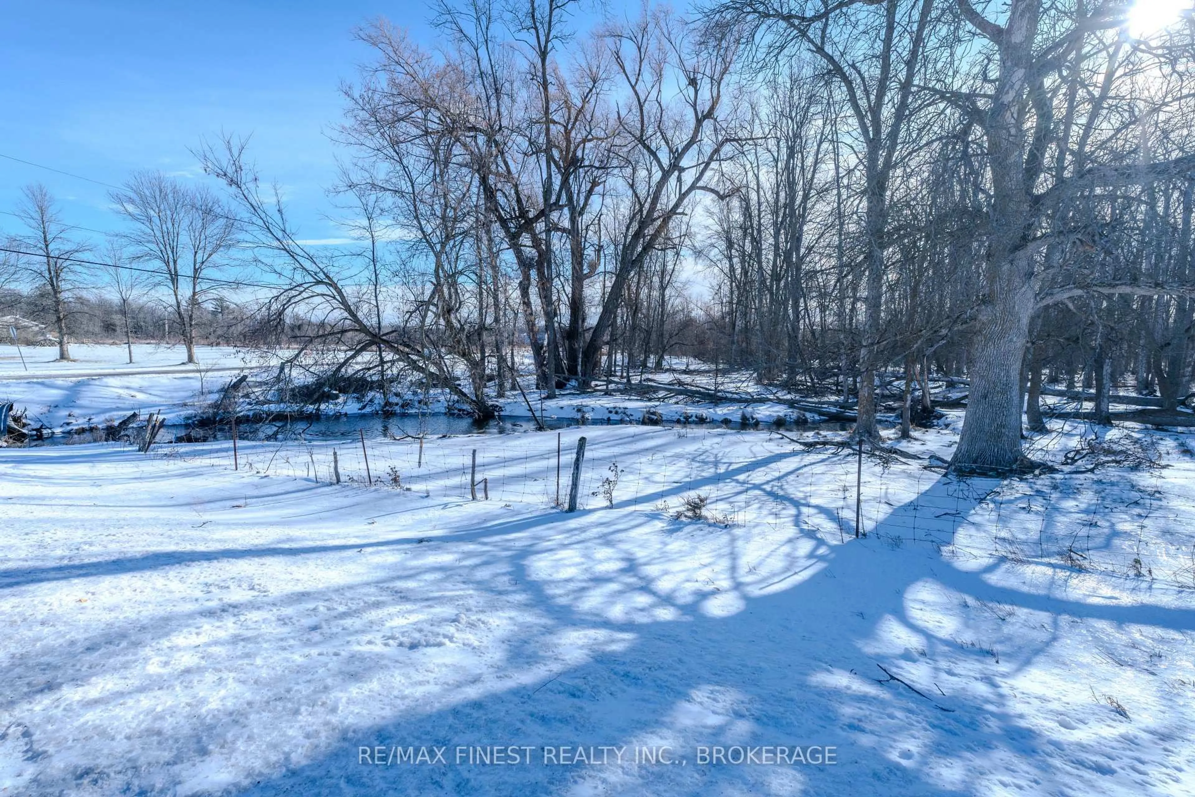 A pic from outside/outdoor area/front of a property/back of a property/a pic from drone, water/lake/river/ocean view for 888 Simmons Rd, Bissett Creek Ontario K0H 2H0