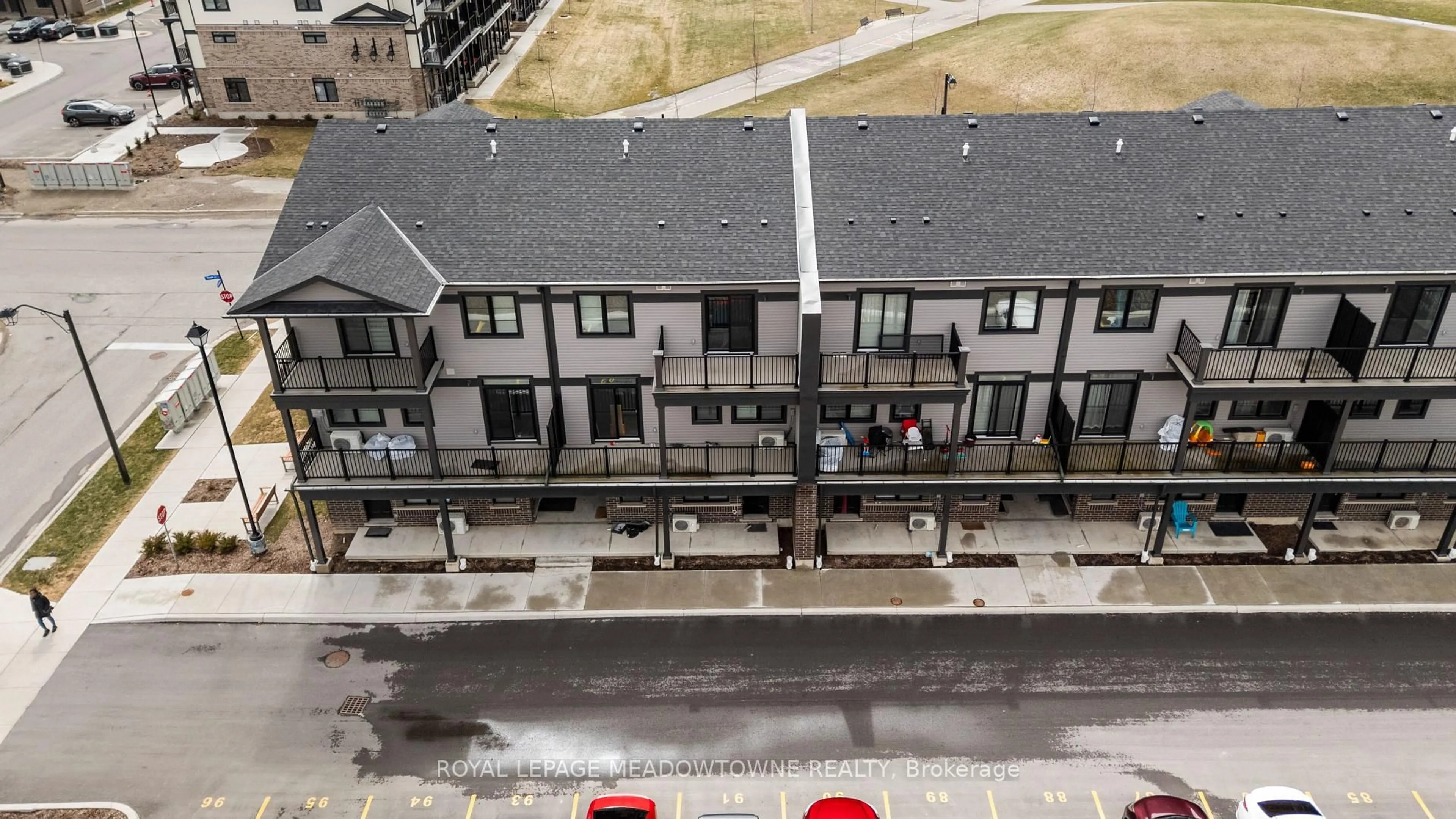 A pic from outside/outdoor area/front of a property/back of a property/a pic from drone, city buildings view from balcony for 182 Oat Lane #6, Kitchener Ontario N2R 0S8