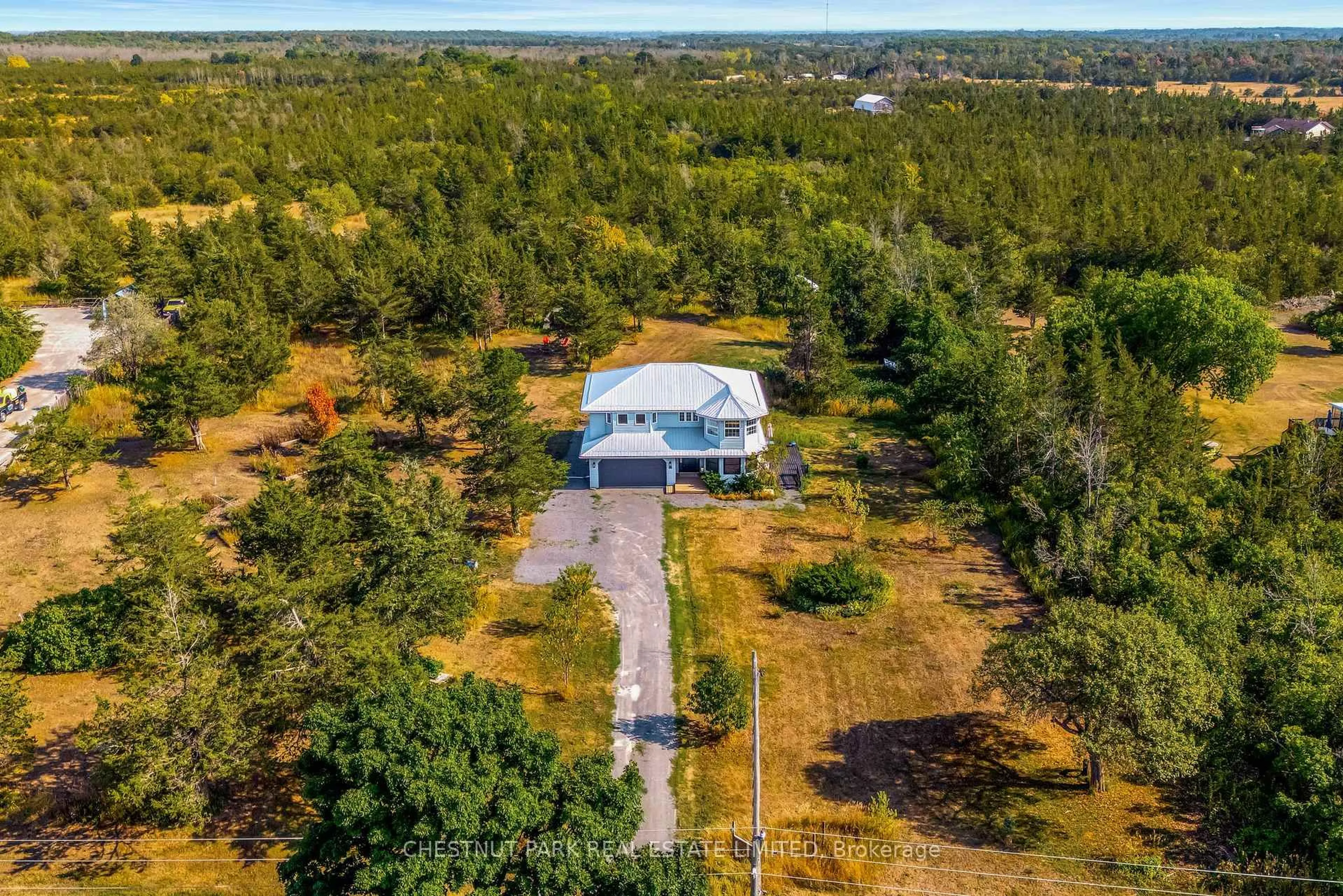 A pic from outside/outdoor area/front of a property/back of a property/a pic from drone, unknown for 62 Mitchells Crossroad, Prince Edward County Ontario K0K 2T0