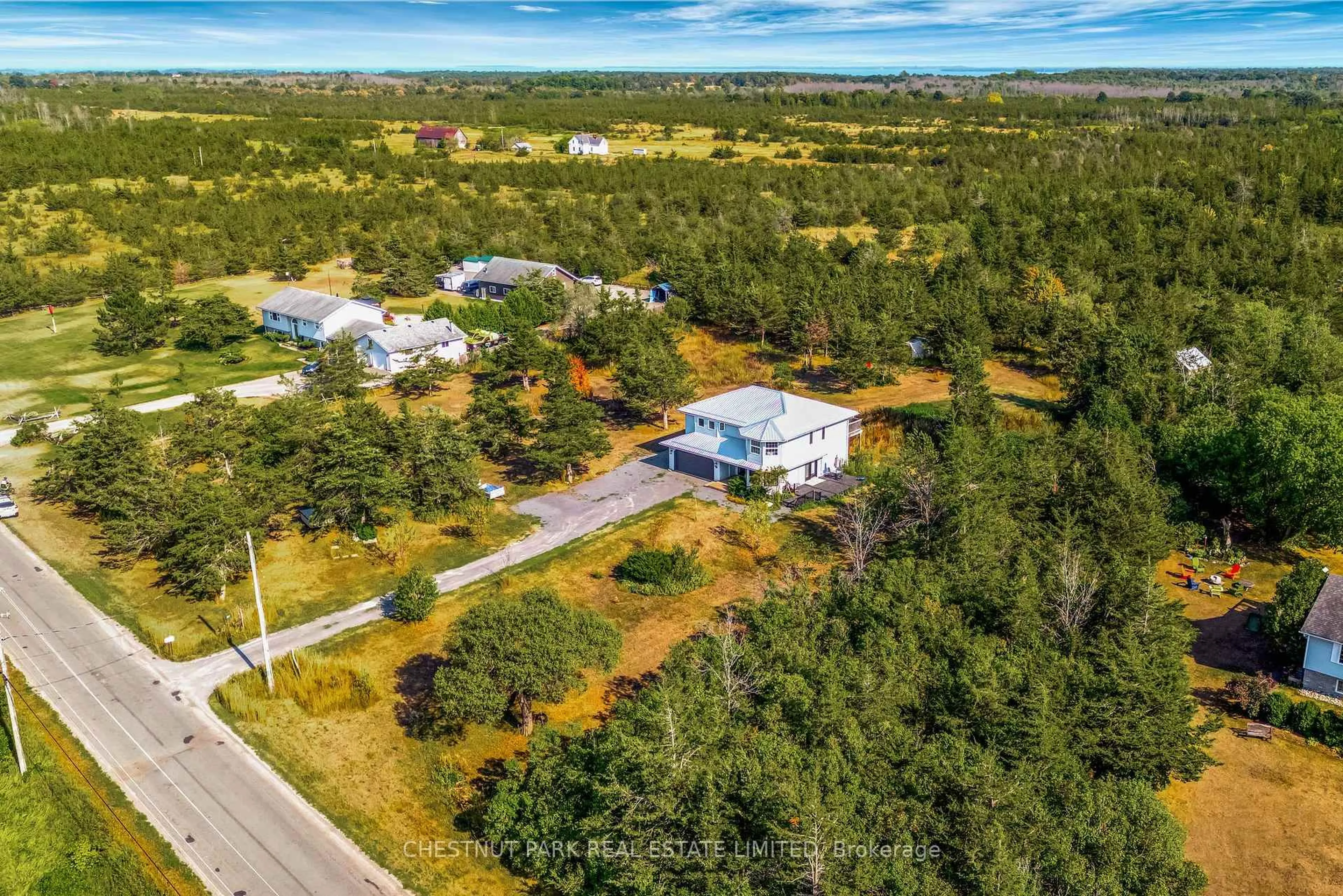 A pic from outside/outdoor area/front of a property/back of a property/a pic from drone, unknown for 62 Mitchells Crossroad, Prince Edward County Ontario K0K 2T0