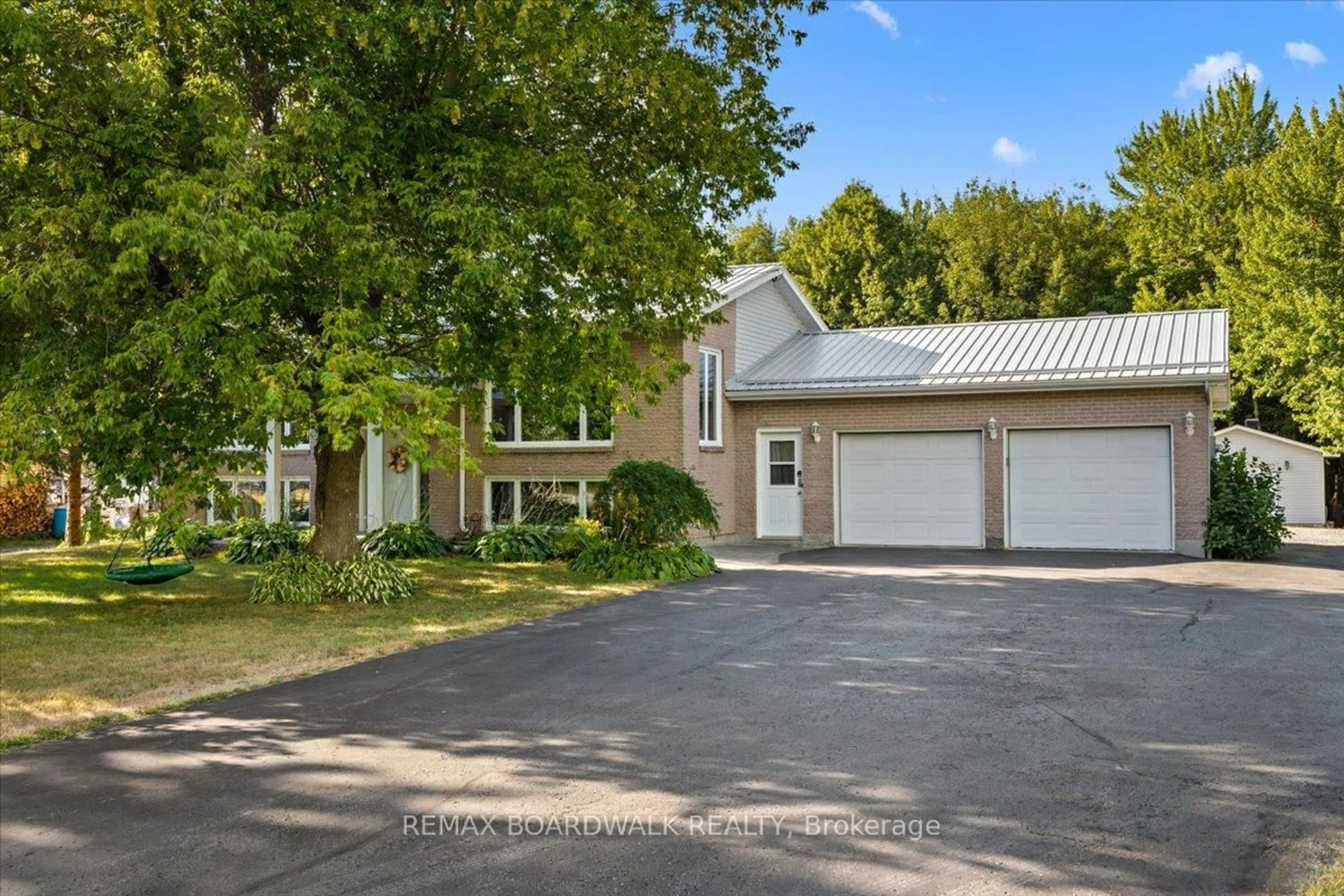 A pic from outside/outdoor area/front of a property/back of a property/a pic from drone, street for 2144 Route 500 Rd, The Nation Ontario K0A 1W0