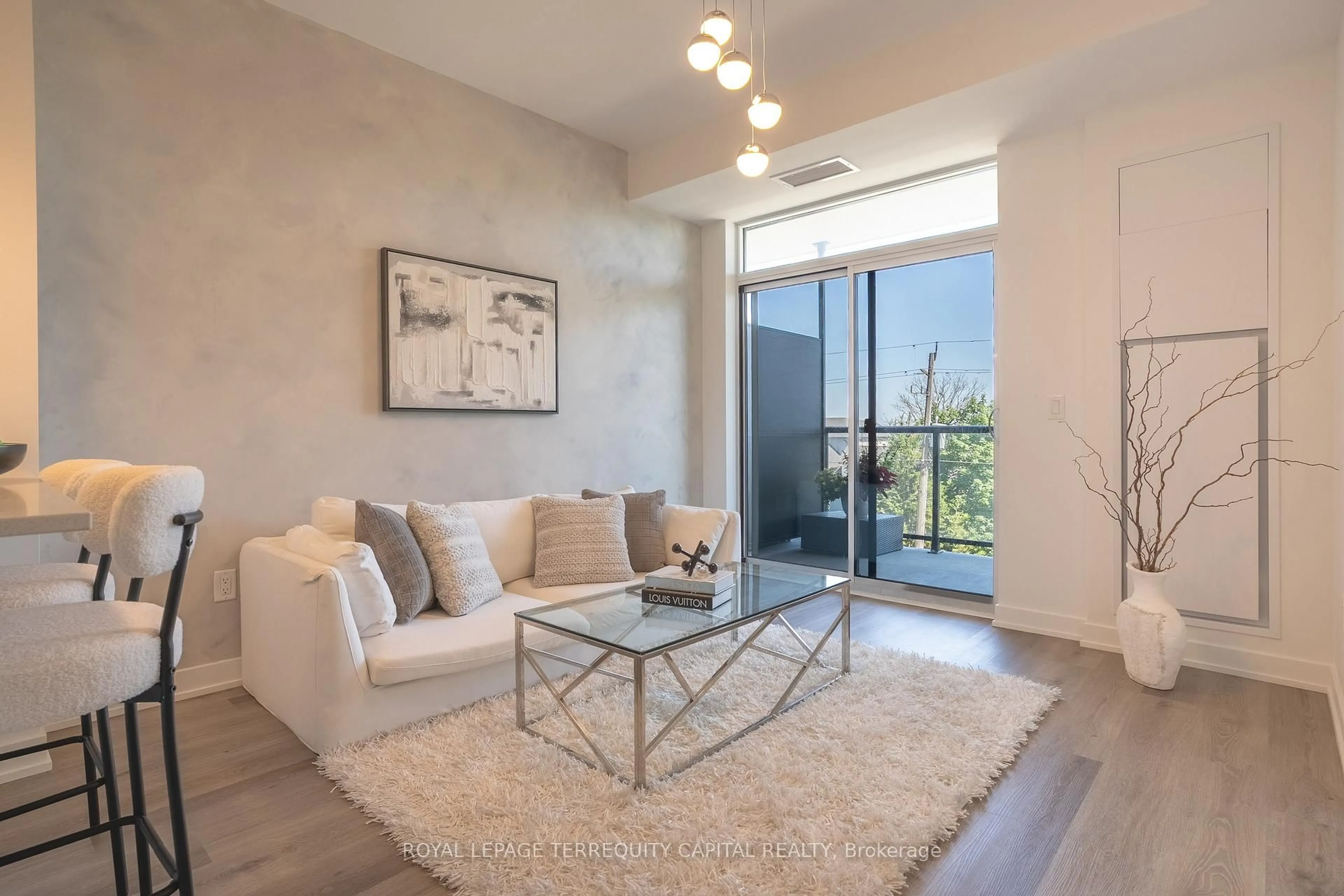 Living room with furniture, unknown for 600 North Service Rd #313, Hamilton Ontario L8E 0L2