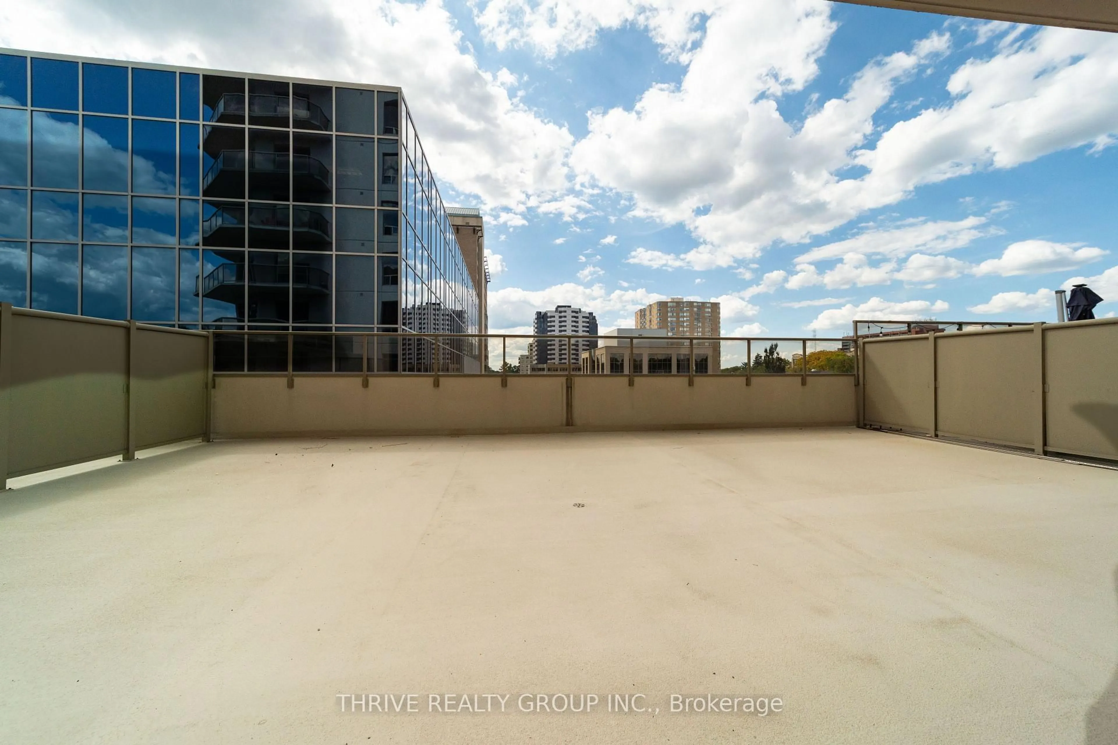 Patio, city buildings view from balcony for 250 Pall Mall St #407, London East Ontario N6A 6K3