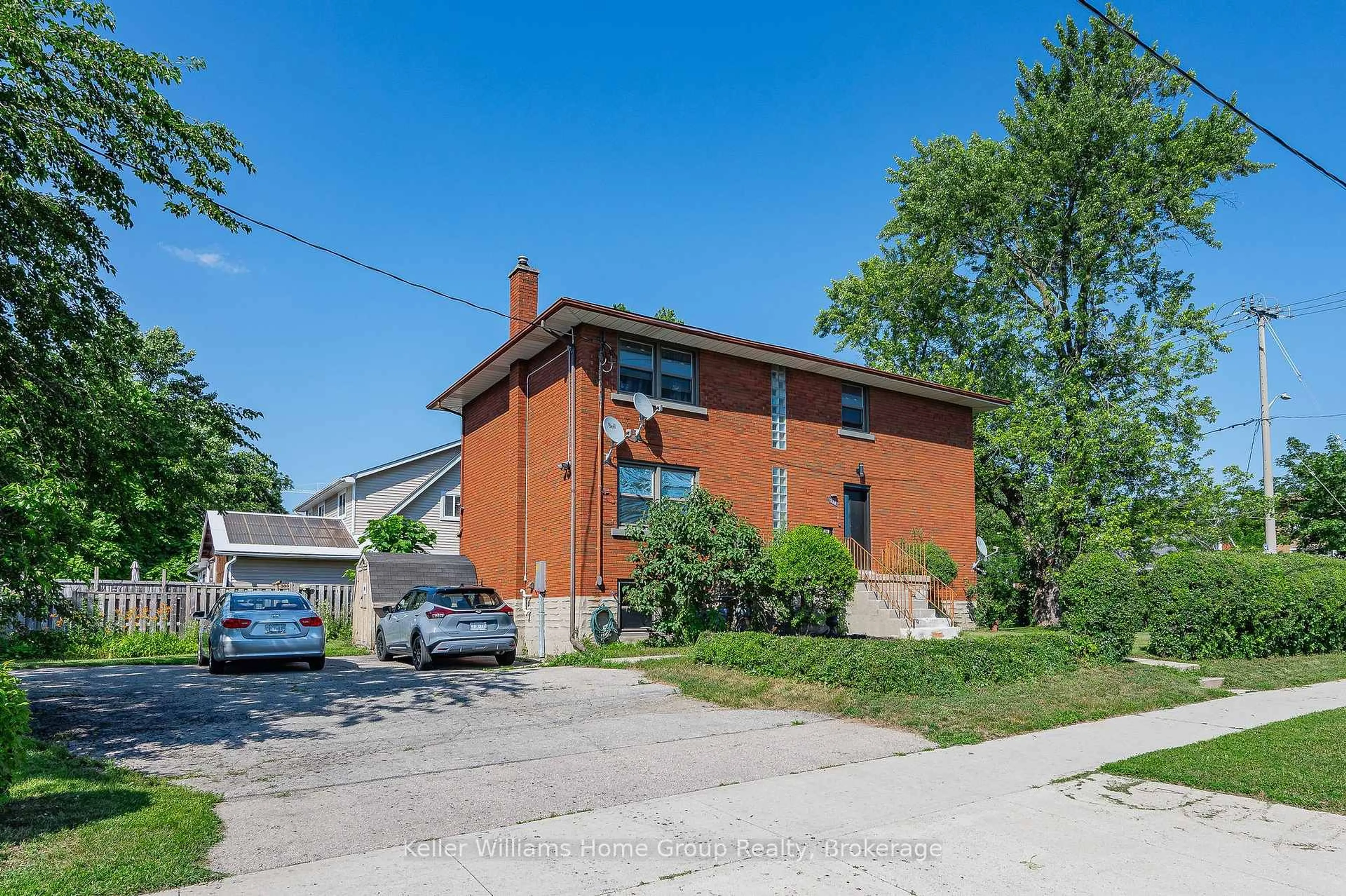Home with brick exterior material, street for 228 Connaught St, Kitchener Ontario N2C 1B3