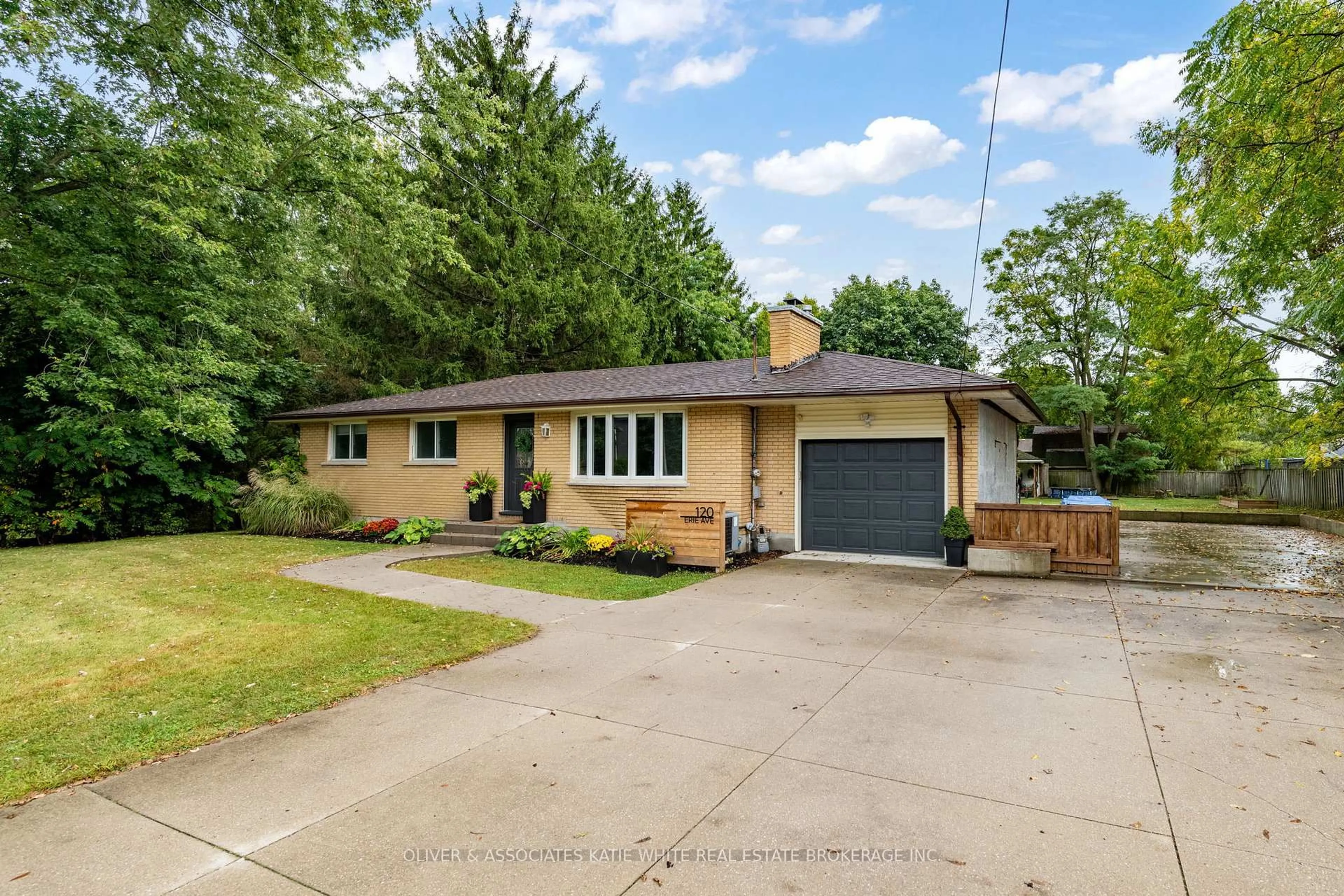 Home with brick exterior material, street for 120 Erie Ave, Middlesex Centre Ontario N0L 1R0