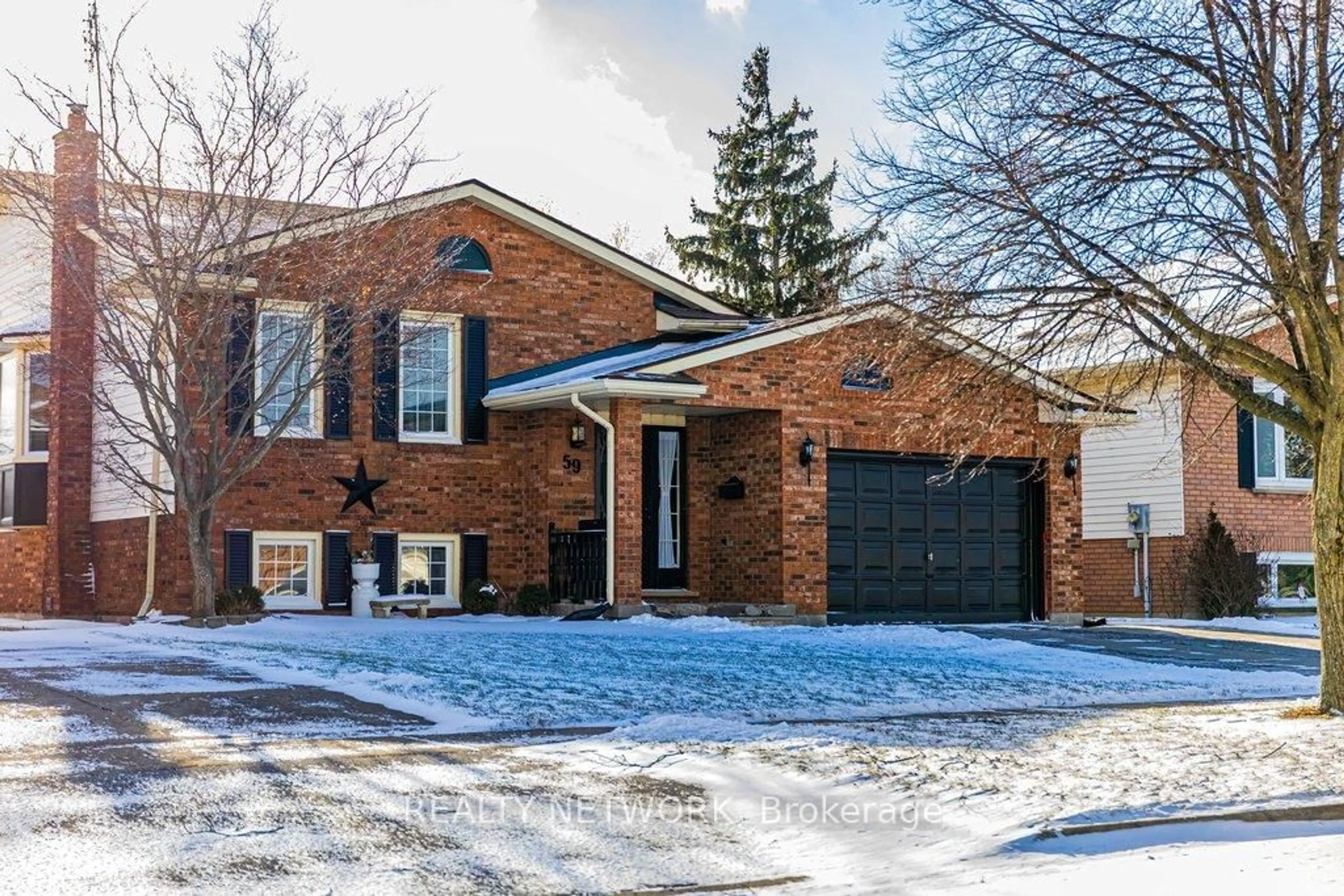 Home with brick exterior material, street for 59 Acadia Dr, Welland Ontario L3C 6L4