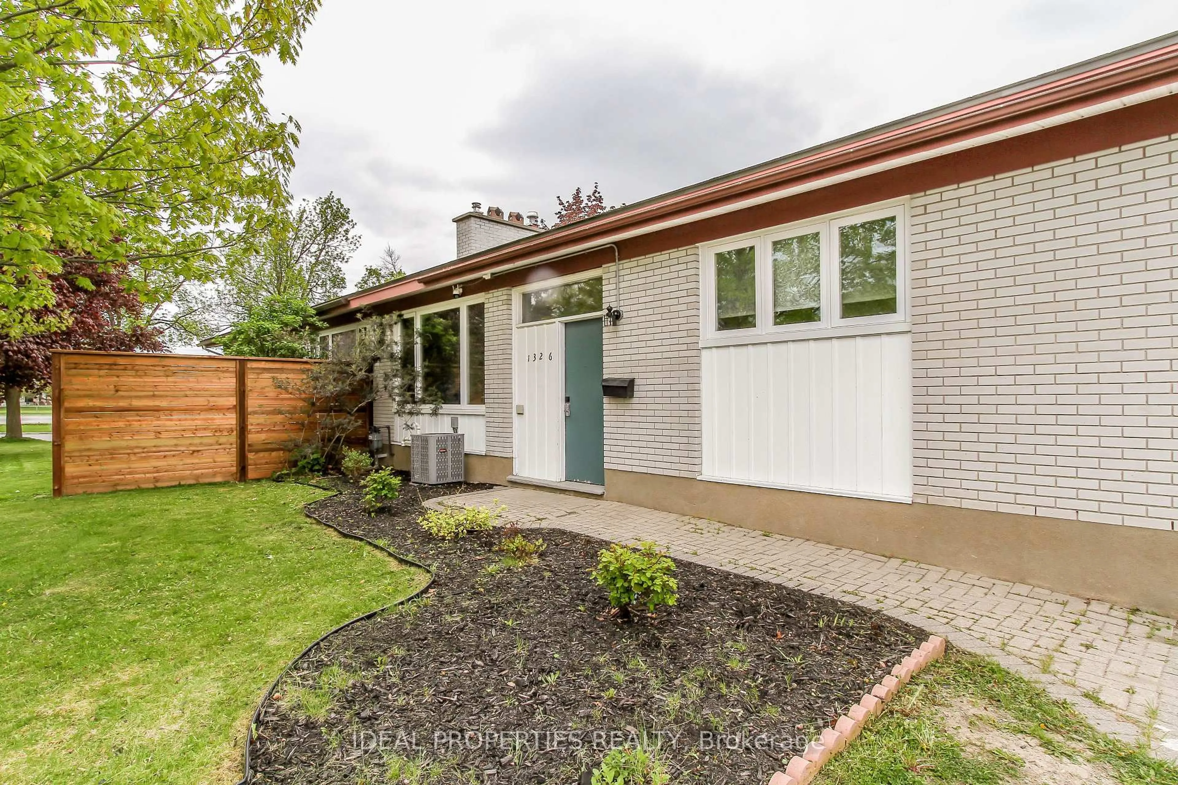 Home with brick exterior material, street for 1326 Tara Dr, Ottawa Ontario K2C 0S7