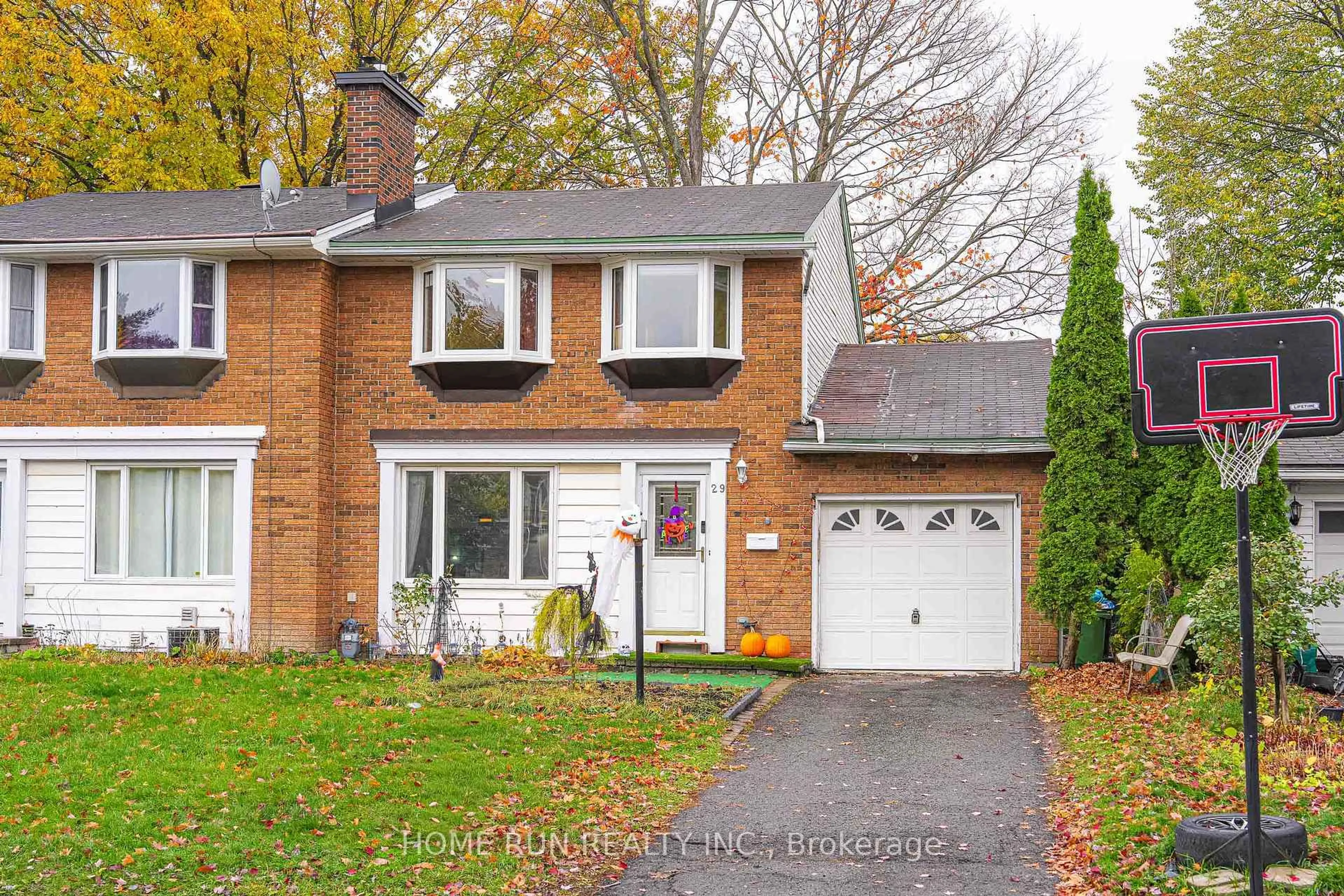 Home with brick exterior material, street for 29 Cymbeline Dr, Ottawa Ontario K2H 7X9