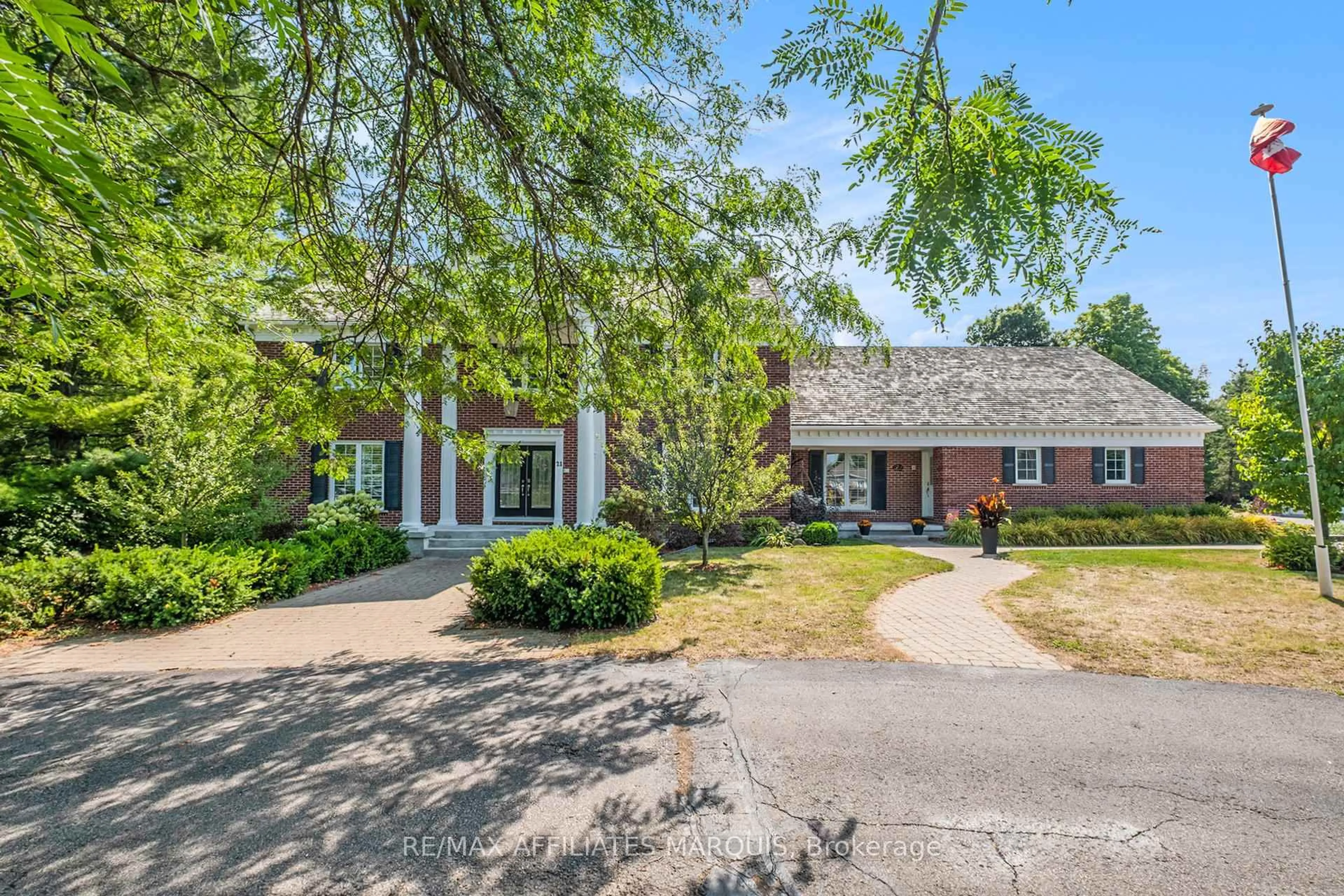 Home with brick exterior material, street for 21 Cedar Lane, Rideau Lakes Ontario K7A 4S5