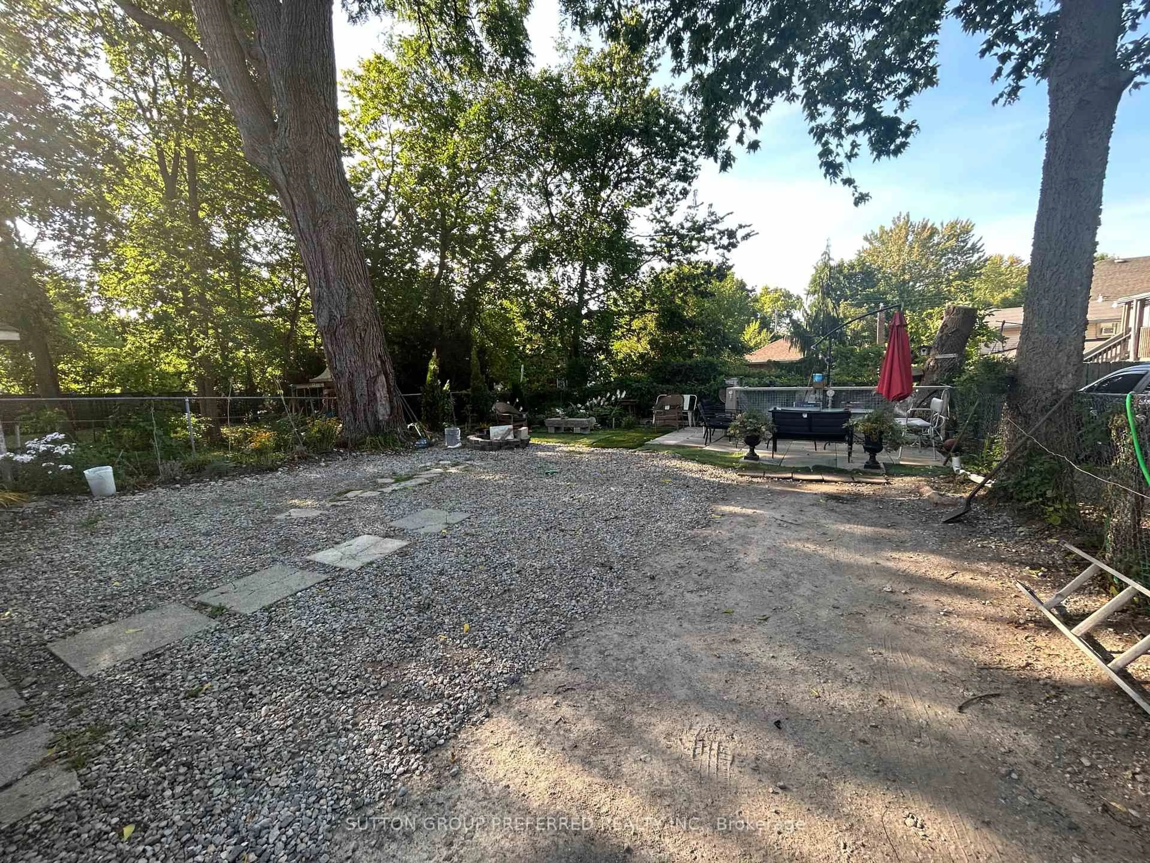 A pic from outside/outdoor area/front of a property/back of a property/a pic from drone, forest/trees view for 51 Stanley St, London South Ontario N6C 1B2