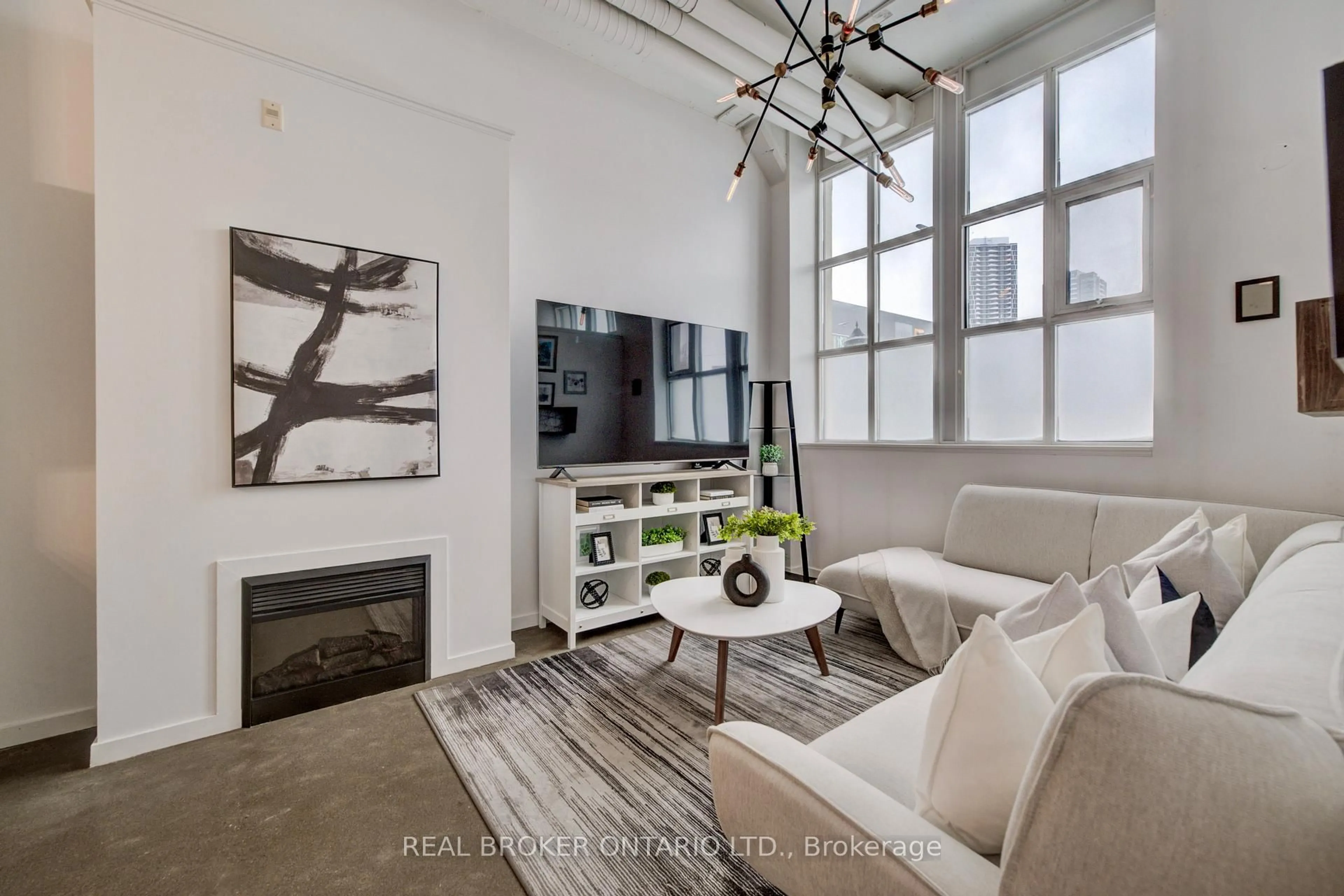 Living room with furniture, cement floor for 410 King St #126, Kitchener Ontario N2G 1C3