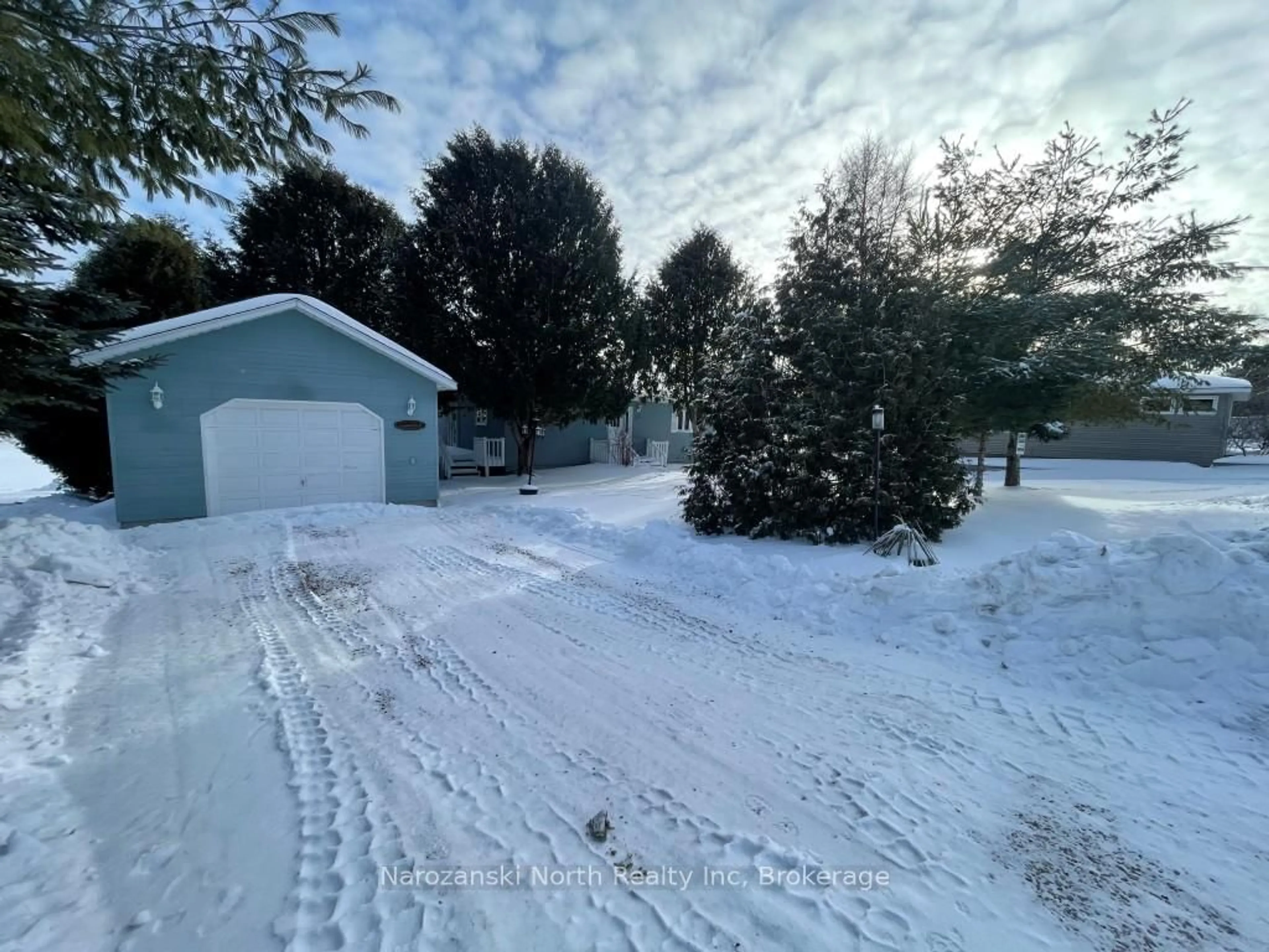 A pic from outside/outdoor area/front of a property/back of a property/a pic from drone, street for 57 Lise St, French River Ontario P0M 1A0