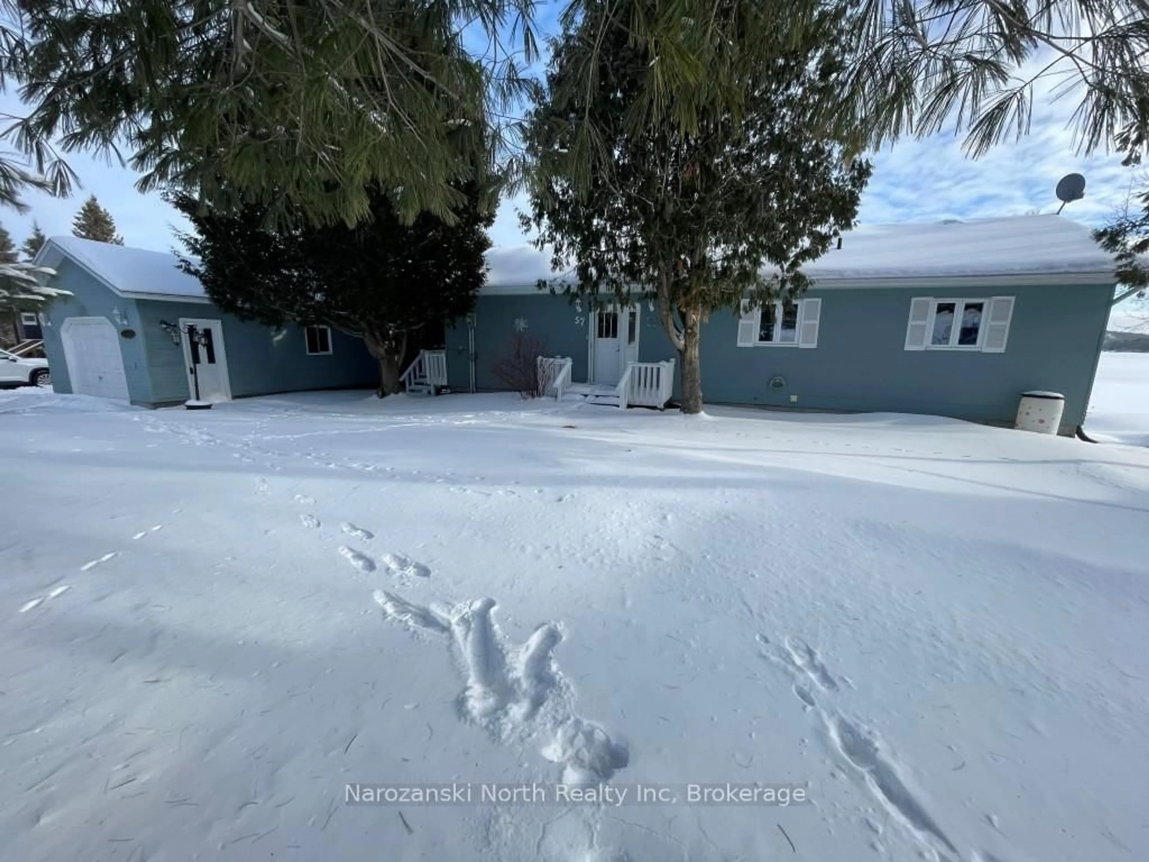 A pic from outside/outdoor area/front of a property/back of a property/a pic from drone, street for 57 Lise St, French River Ontario P0M 1A0