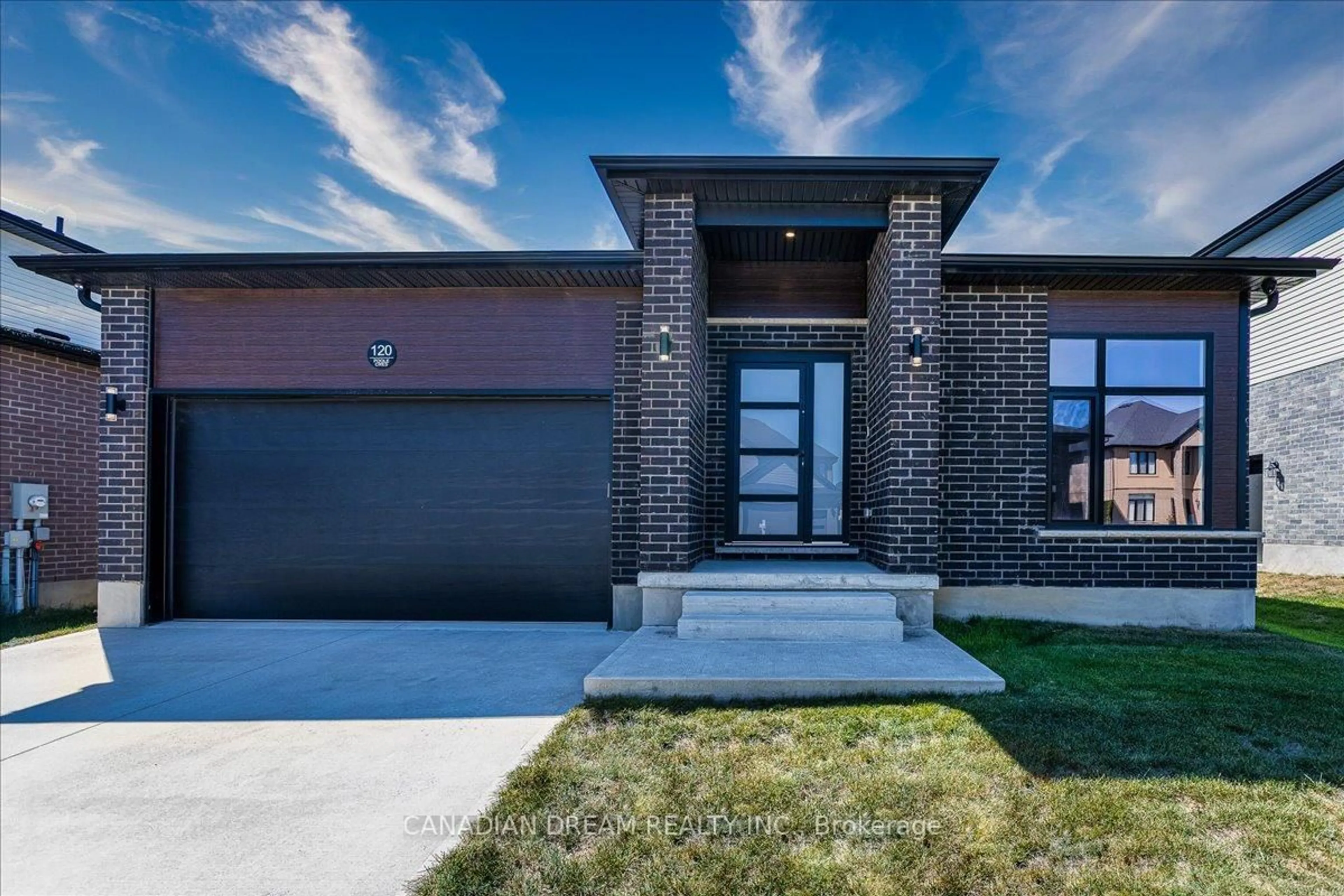 Home with brick exterior material, street for 120 Poole Cres, Middlesex Centre Ontario N0L 1R0