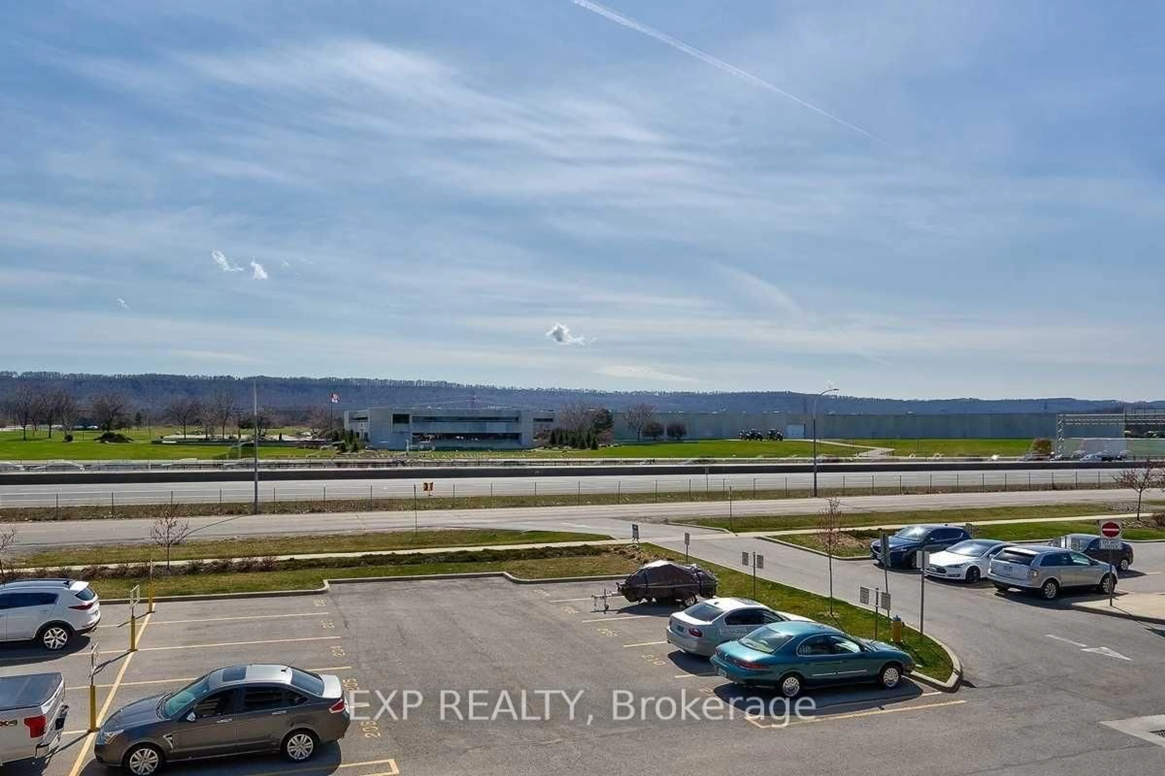 A pic from outside/outdoor area/front of a property/back of a property/a pic from drone, water/lake/river/ocean view for 520 North Service Rd ##211, Grimsby Ontario L3M 0C9