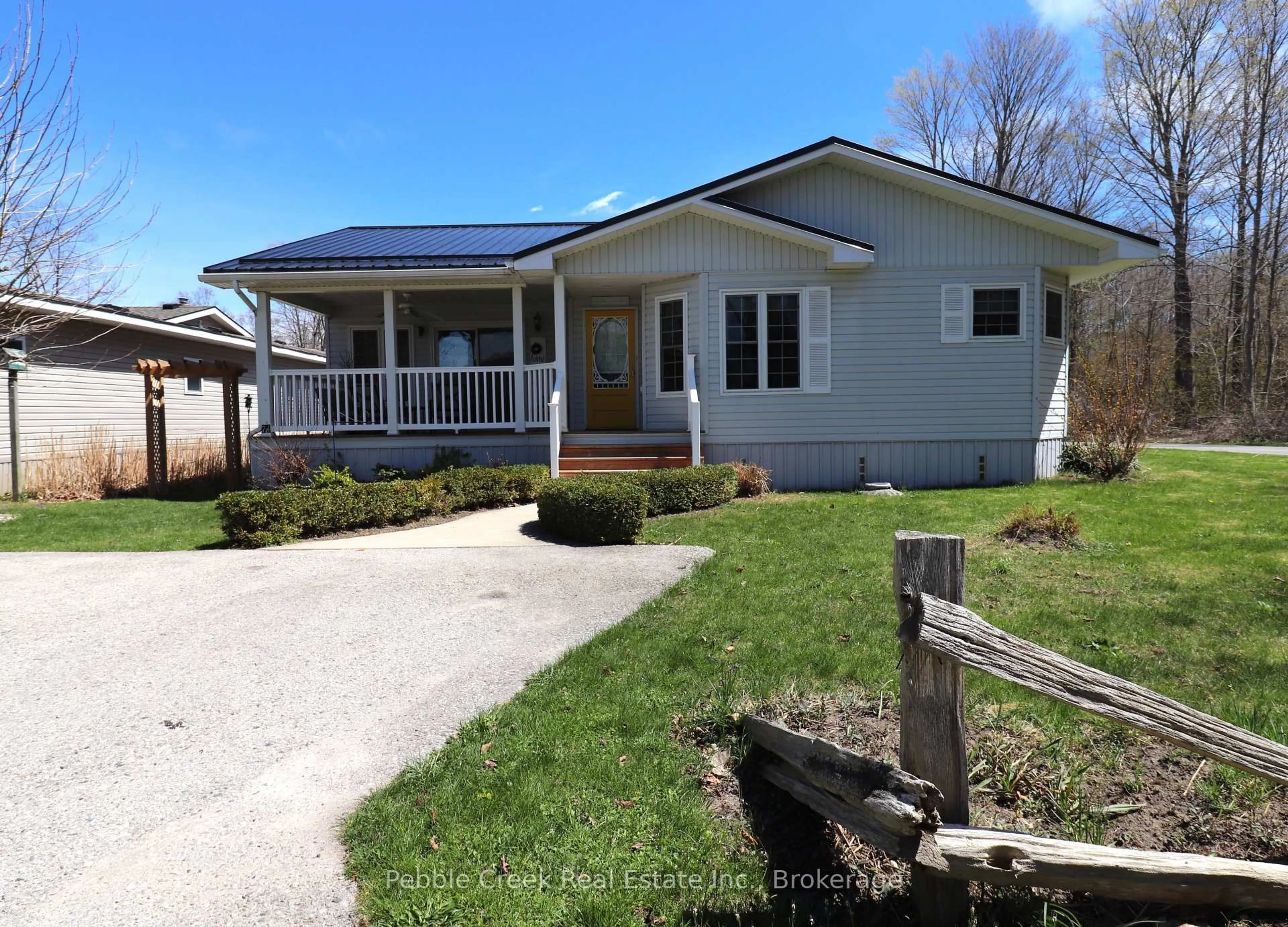 Home with vinyl exterior material, street for 74 Iroquois Lane, Ashfield-Colborne-Wawanosh Ontario N7A 3Y2