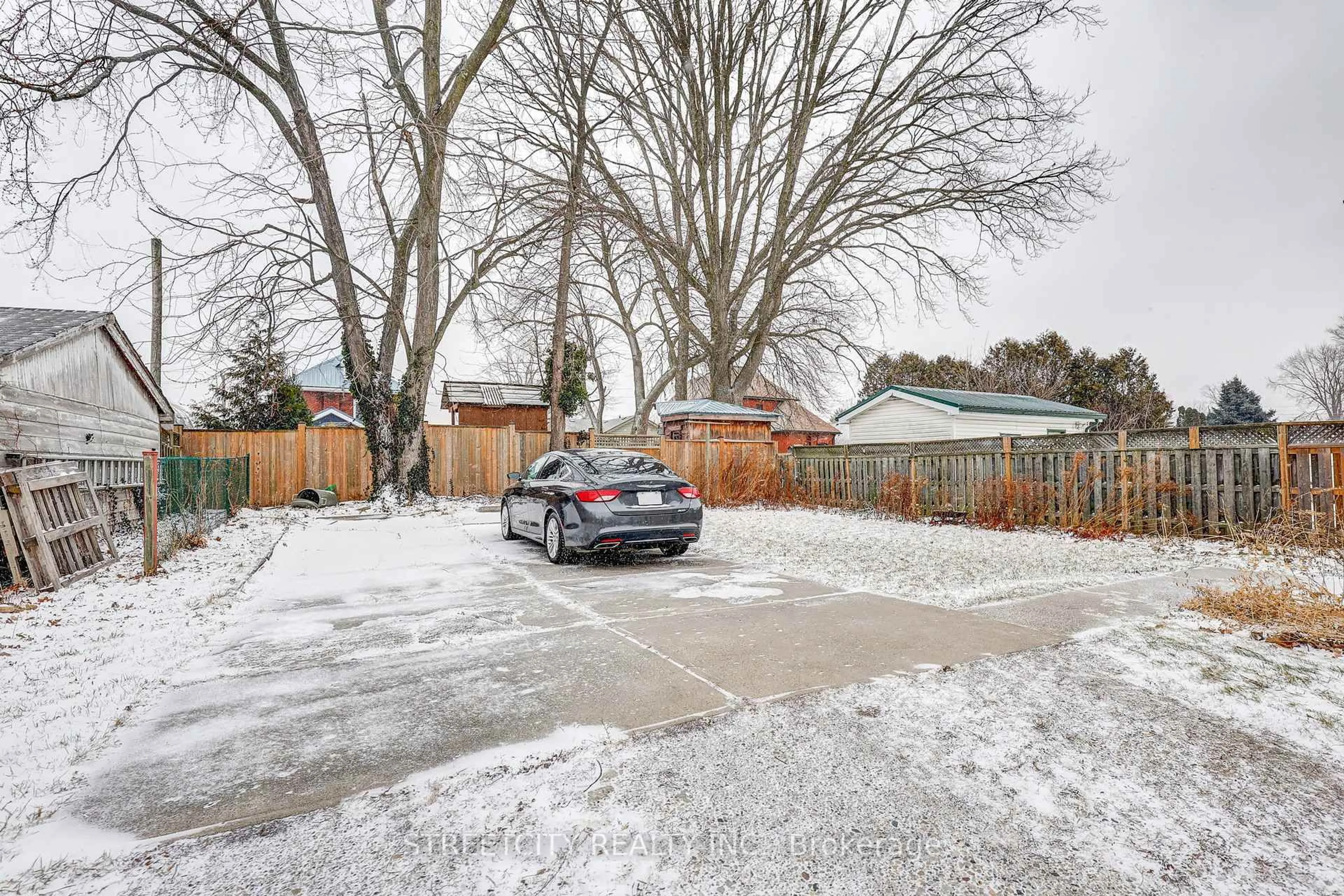 A pic from outside/outdoor area/front of a property/back of a property/a pic from drone, street for 12 Weldon Ave, St. Thomas Ontario N5P 1J6
