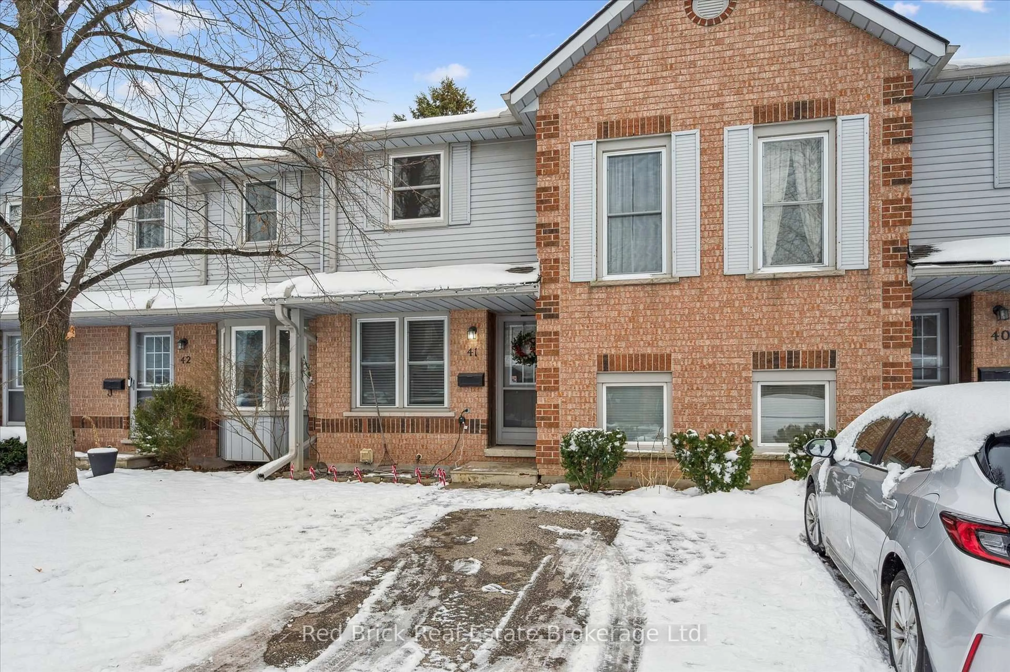 Home with brick exterior material, street for 180 Marksam Rd #41, Guelph Ontario N1H 8G4
