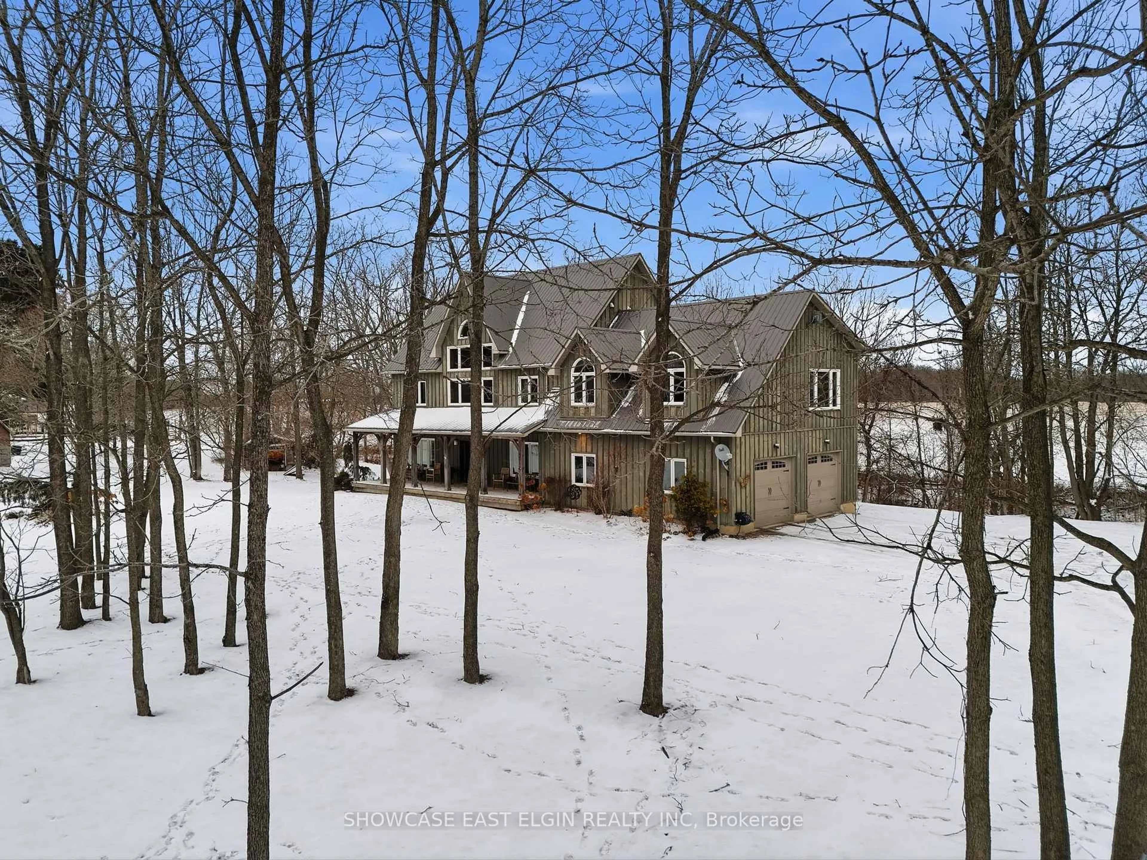 A pic from outside/outdoor area/front of a property/back of a property/a pic from drone, forest/trees view for 47640 RUSH CREEK Line, Malahide Ontario N5H 2R2