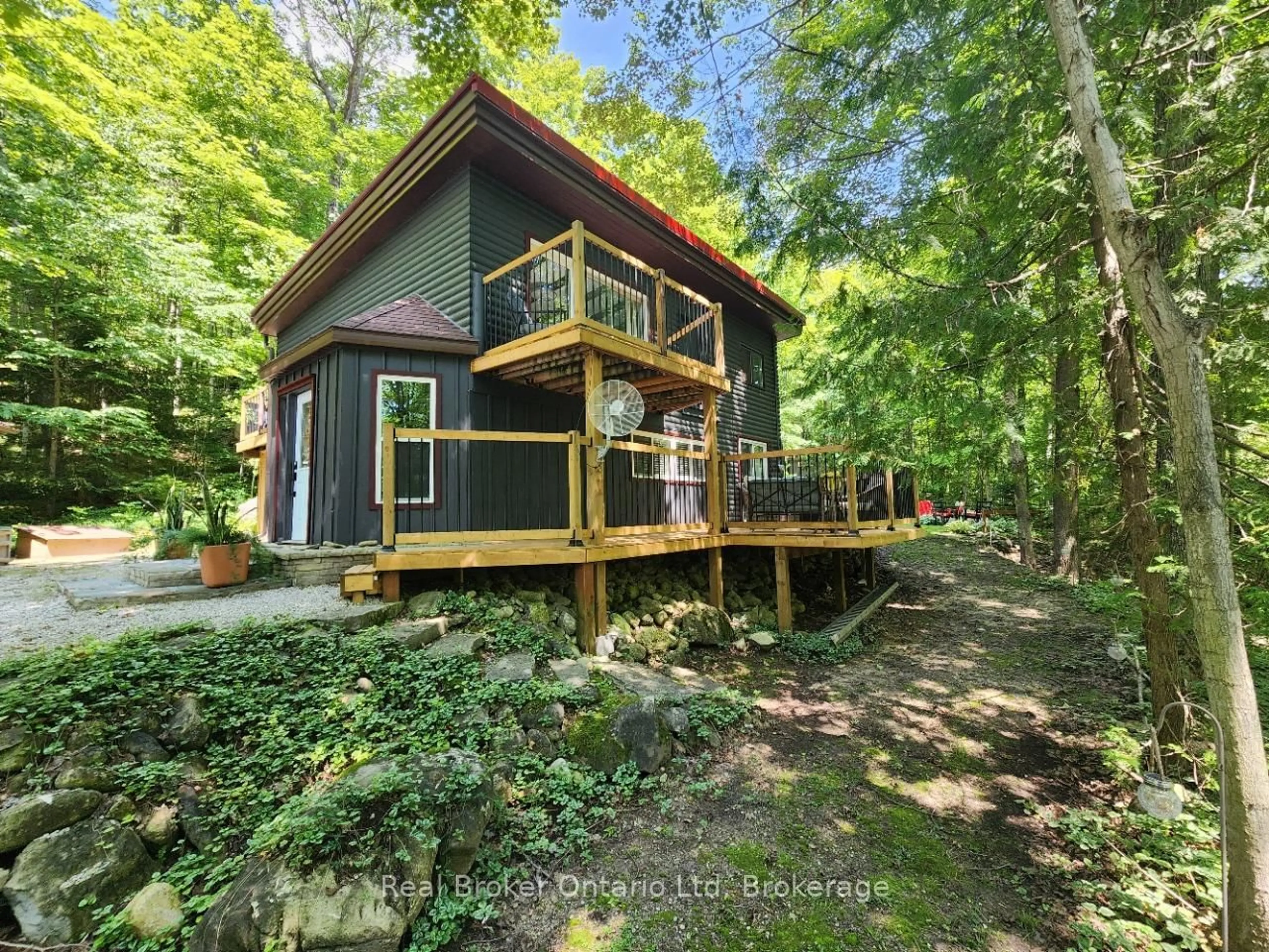 A pic from outside/outdoor area/front of a property/back of a property/a pic from drone, forest/trees view for 12 7th Ave, South Bruce Peninsula Ontario N0H 2T0