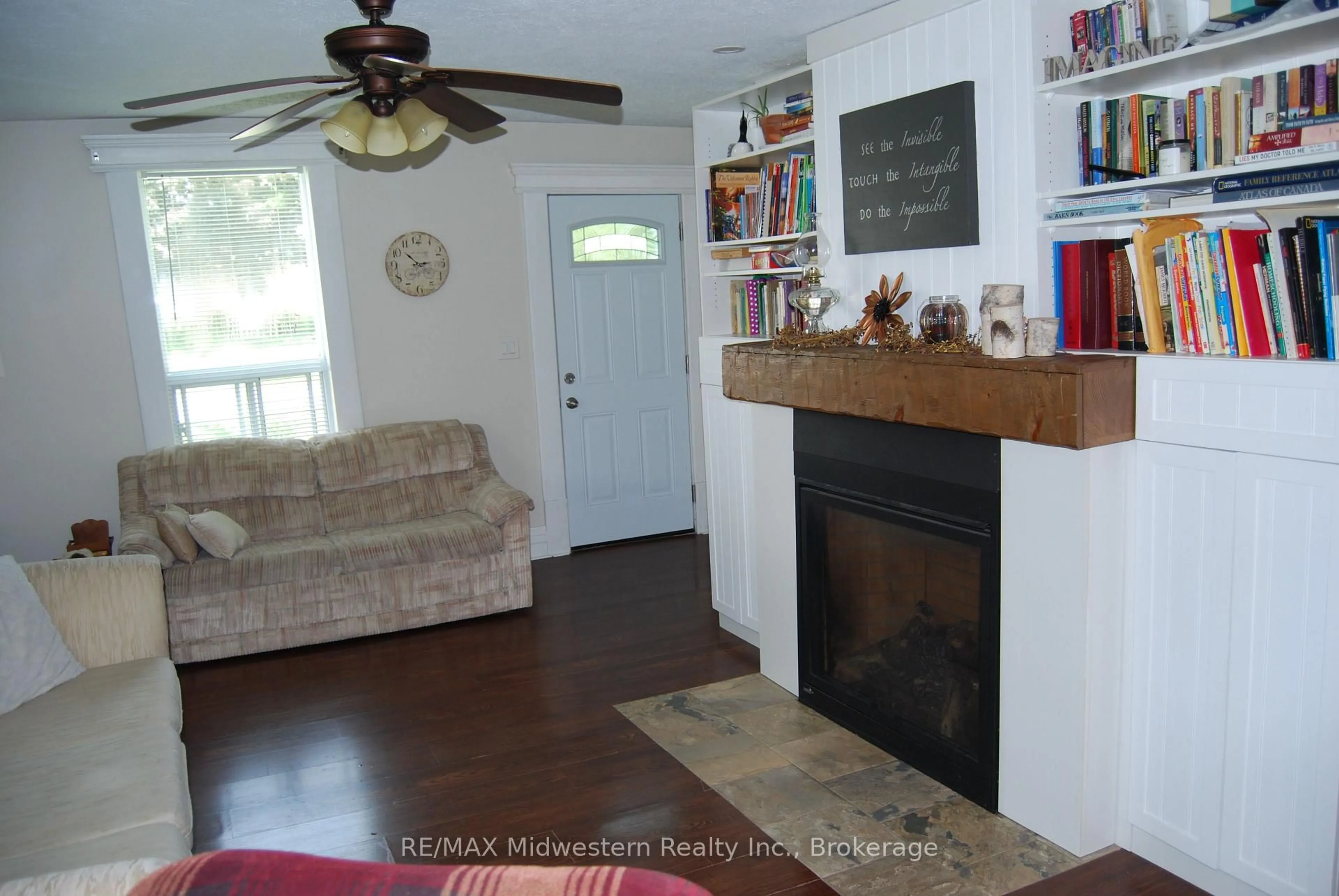 Living room with furniture, wood/laminate floor for 410 Temple St, Minto Ontario N0G 2P0