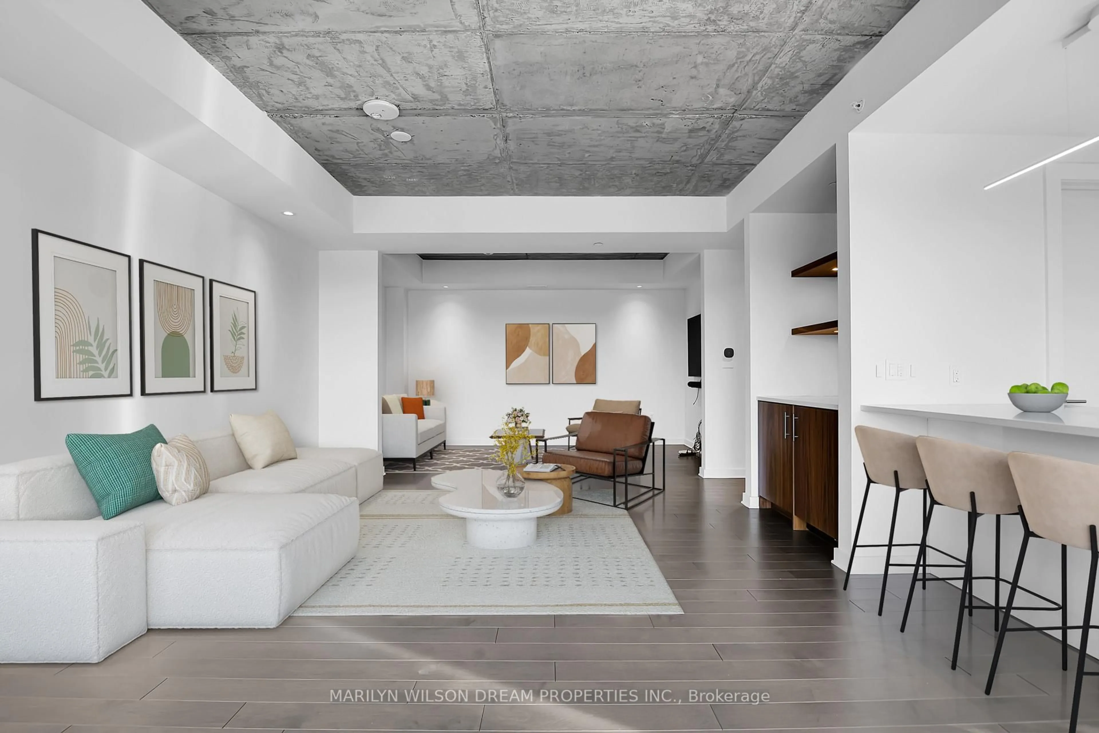 Living room with furniture, cement floor for 135 Barrette St #601, Ottawa Ontario K1L 7Z9