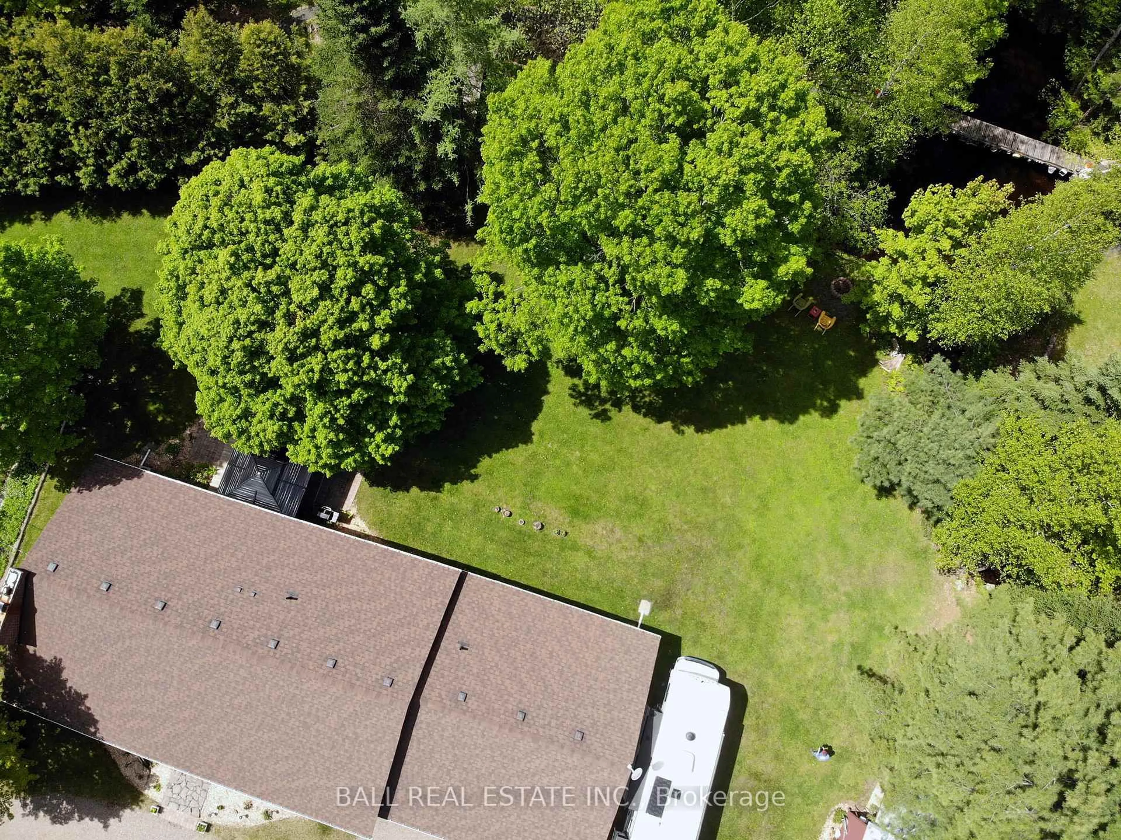 A pic from outside/outdoor area/front of a property/back of a property/a pic from drone, forest/trees view for 1017 Clement Lake Rd, Highlands East Ontario K0L 3C0