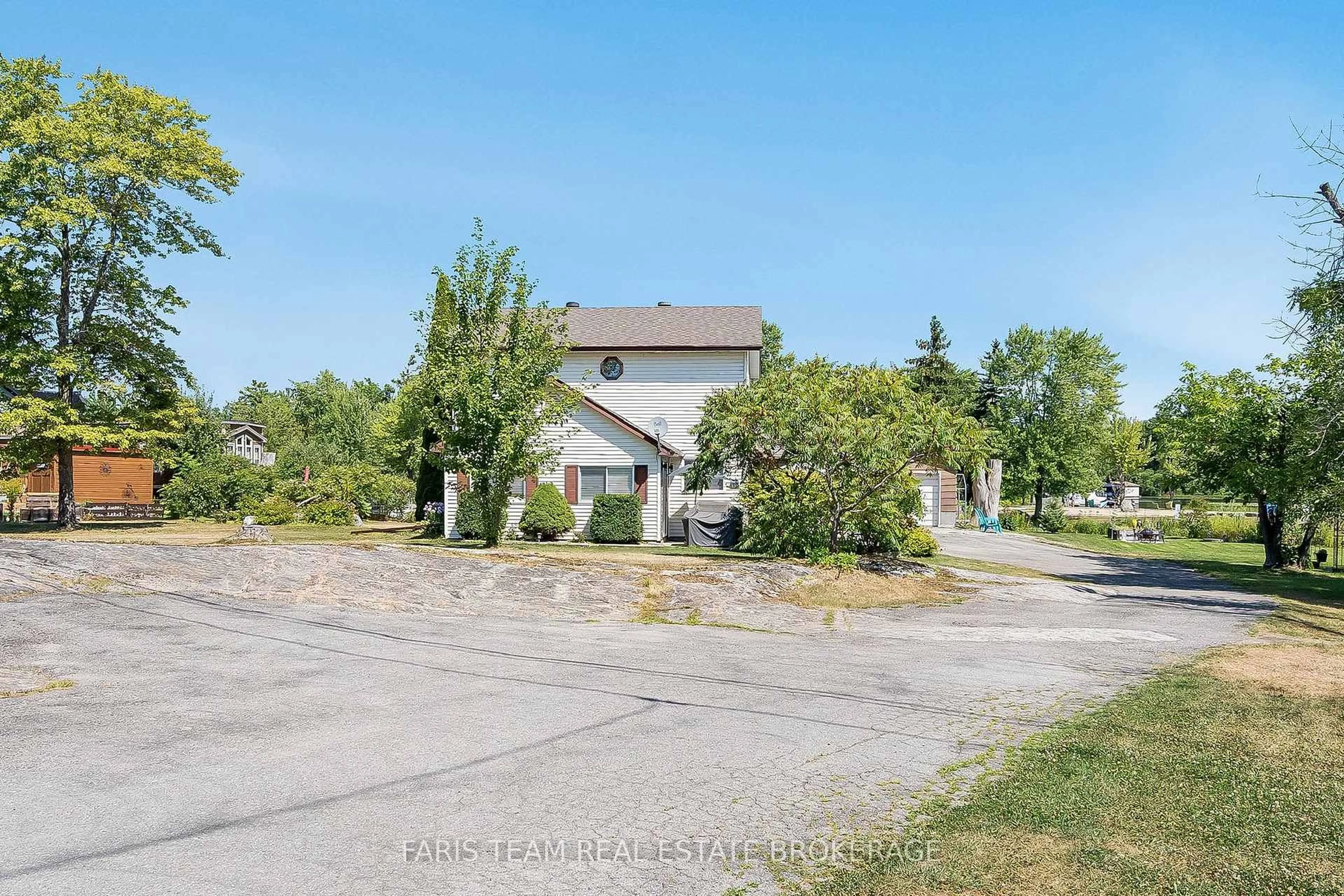 A pic from outside/outdoor area/front of a property/back of a property/a pic from drone, street for 57 Port Severn Rd, Georgian Bay Ontario L0K 1S0