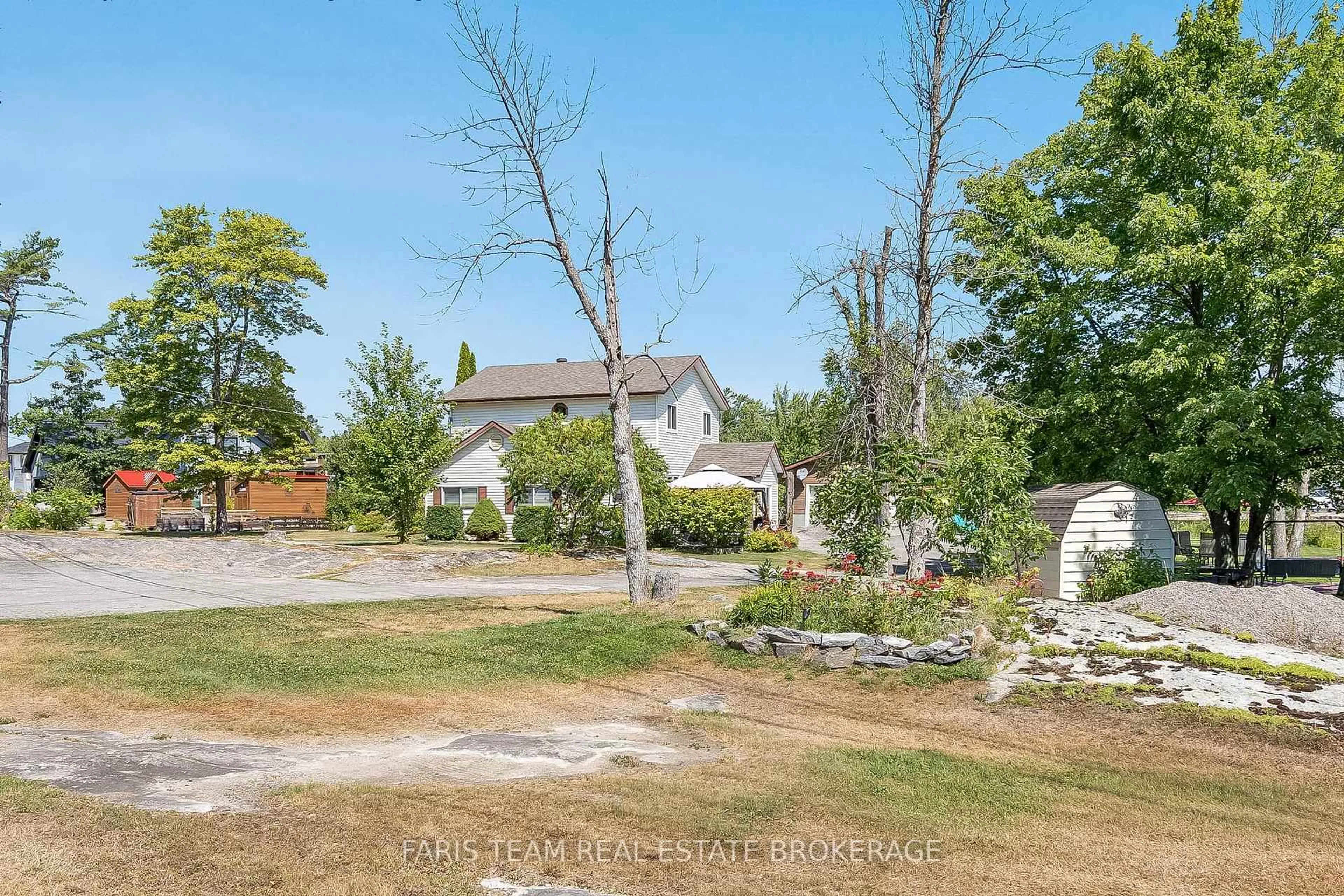 A pic from outside/outdoor area/front of a property/back of a property/a pic from drone, street for 57 Port Severn Rd, Georgian Bay Ontario L0K 1S0