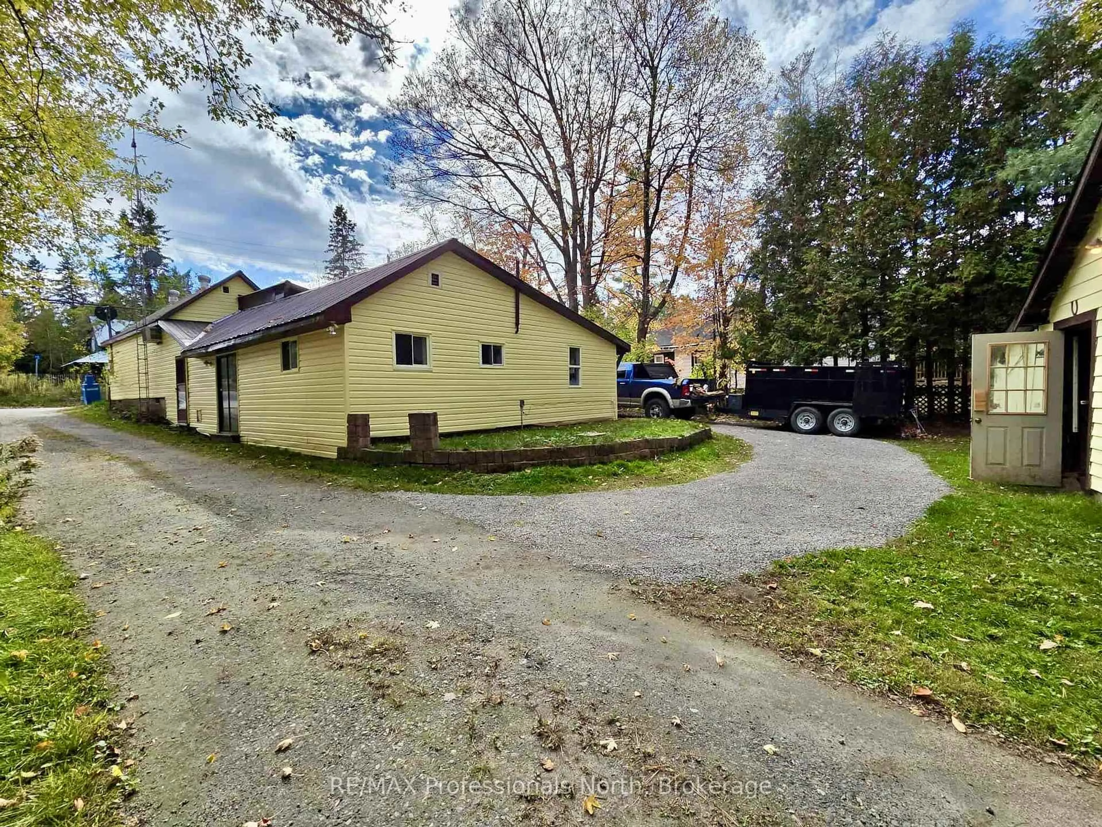A pic from outside/outdoor area/front of a property/back of a property/a pic from drone, street for 1281 Kashagawigamog Lake Rd, Minden Hills Ontario K0M 2K0