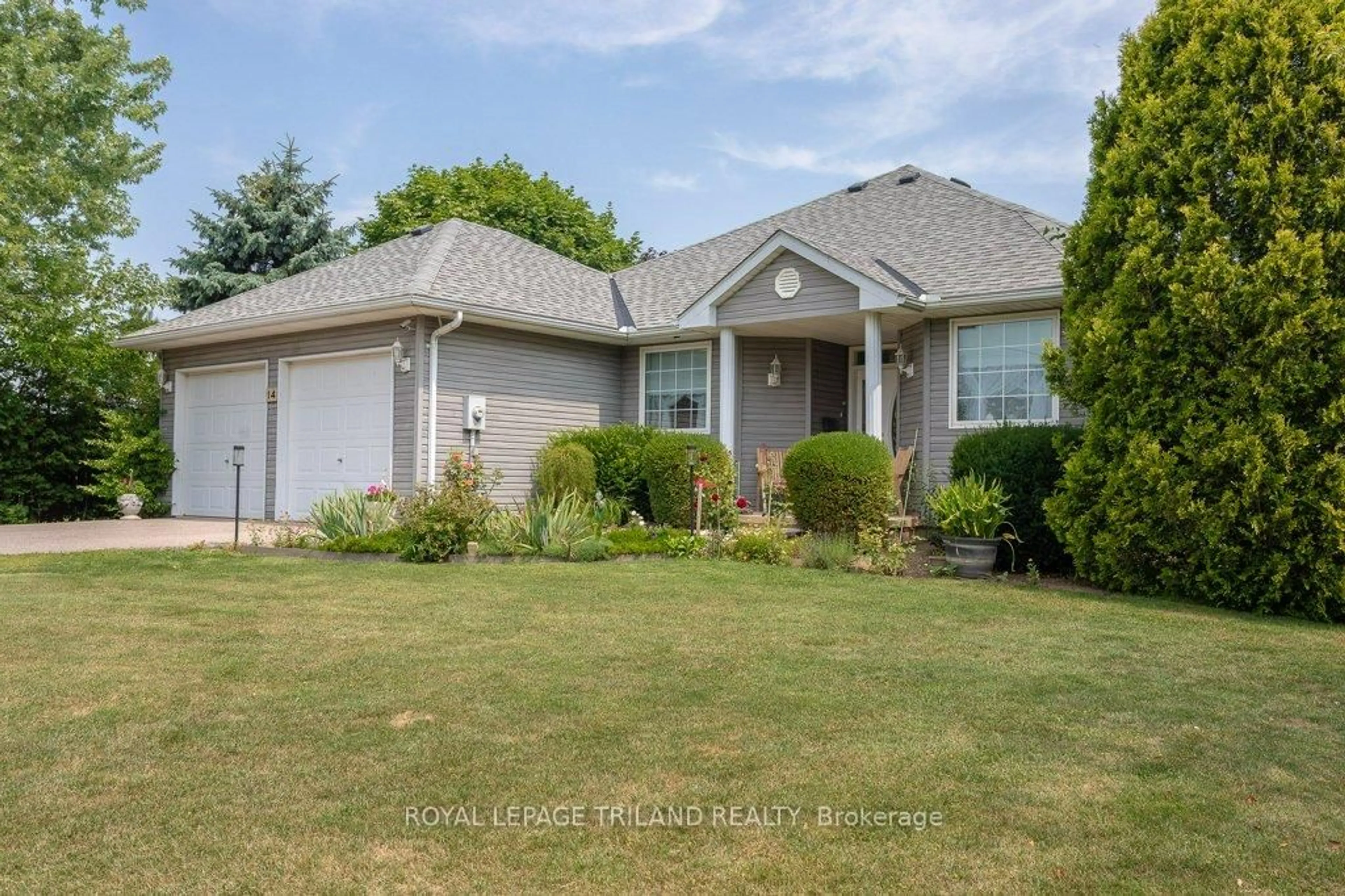 Home with vinyl exterior material, street for 14 Poplar St, Dutton/Dunwich Ontario N0L 2M0