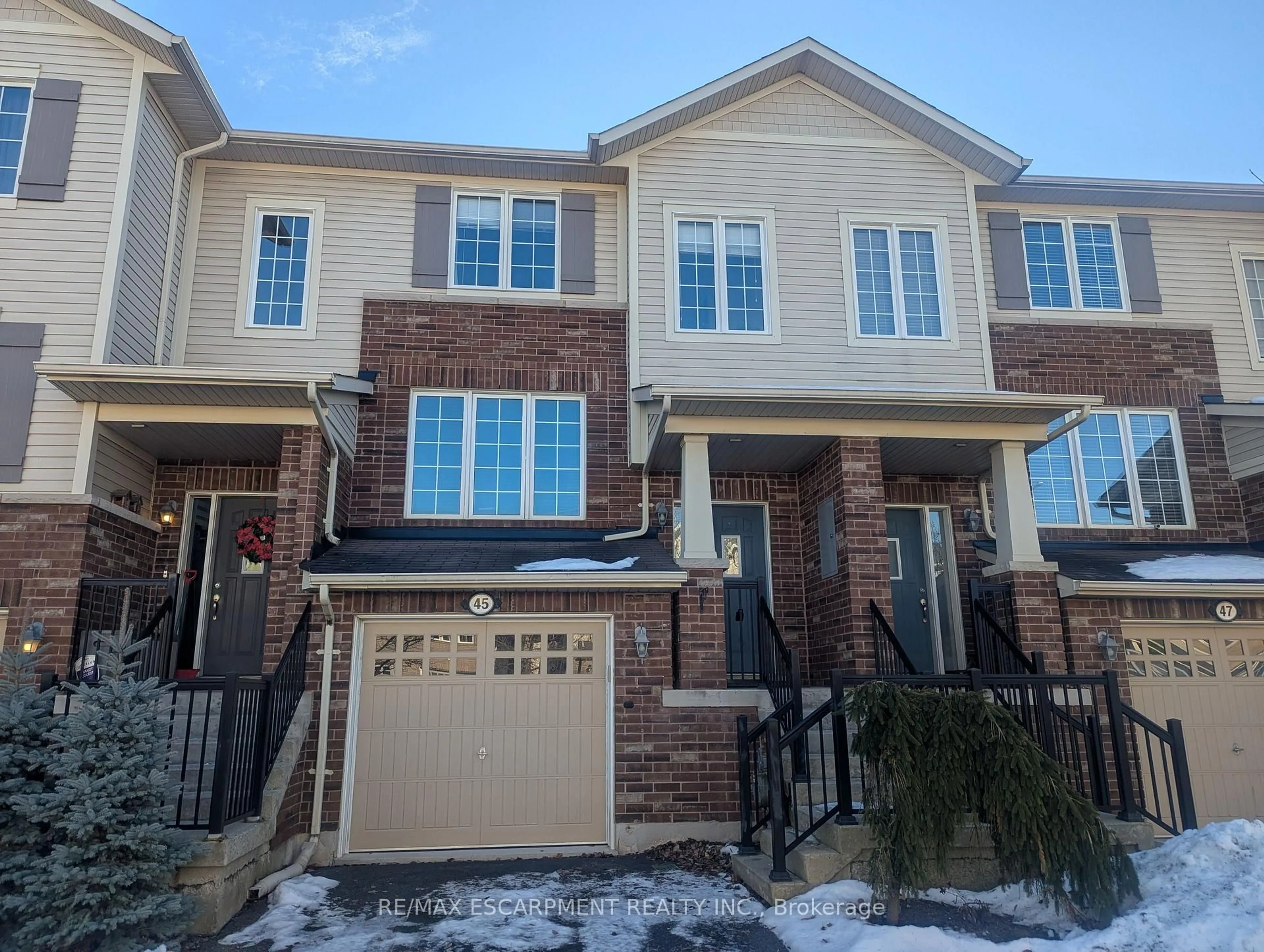 Home with brick exterior material, street for 45 Ohara Lane, Hamilton Ontario L9K 0C7