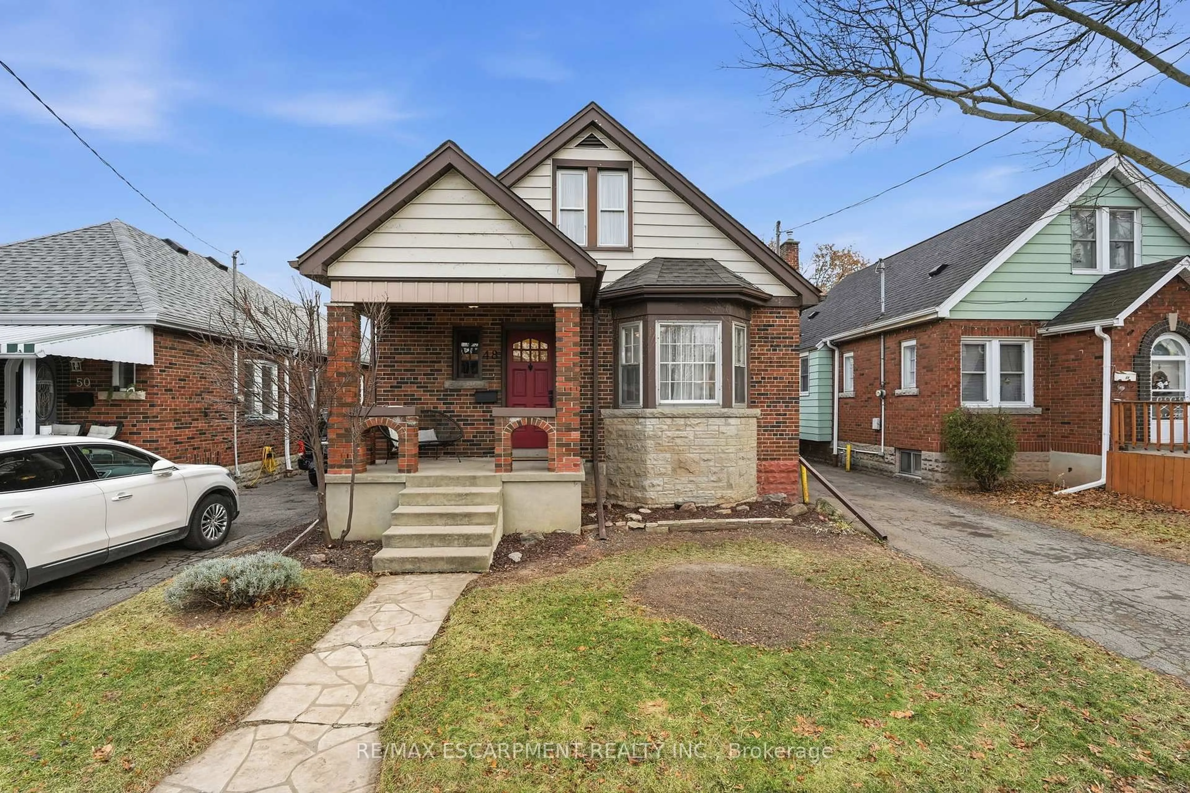 Home with brick exterior material, street for 48 Weir St, Hamilton Ontario L8H 5E6