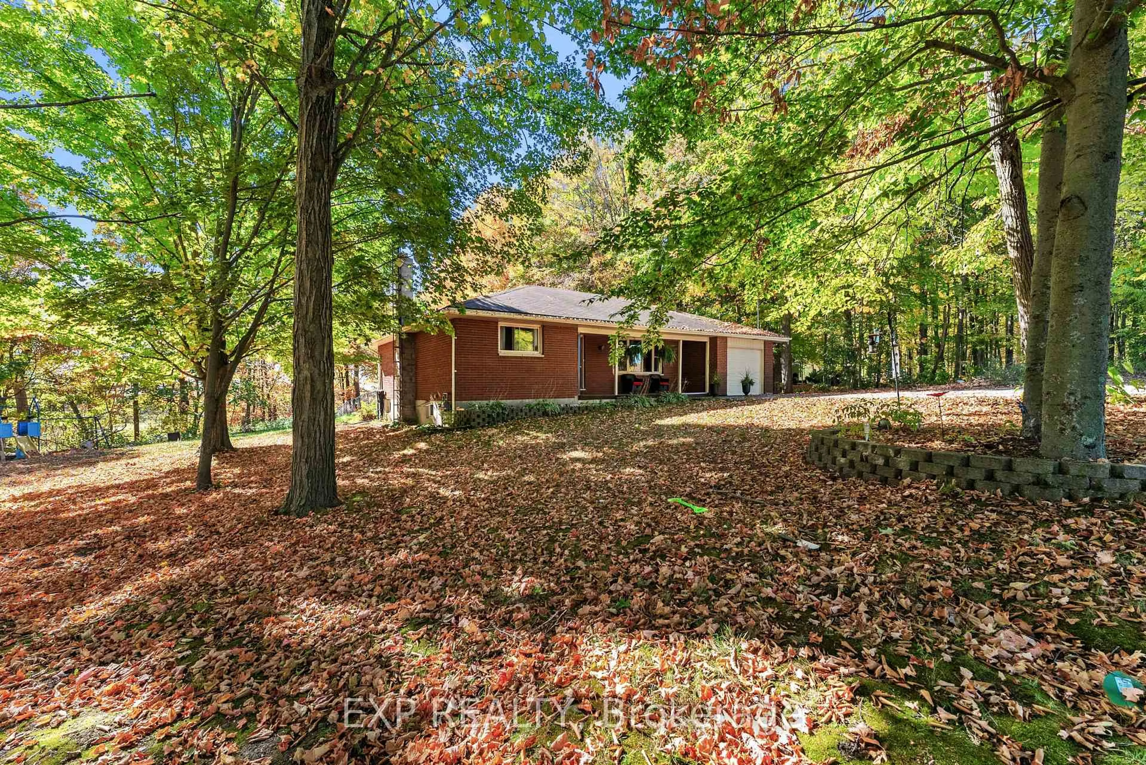 A pic from outside/outdoor area/front of a property/back of a property/a pic from drone, forest/trees view for 110 Meyers Creek Rd, Quinte West Ontario K8V 5P5