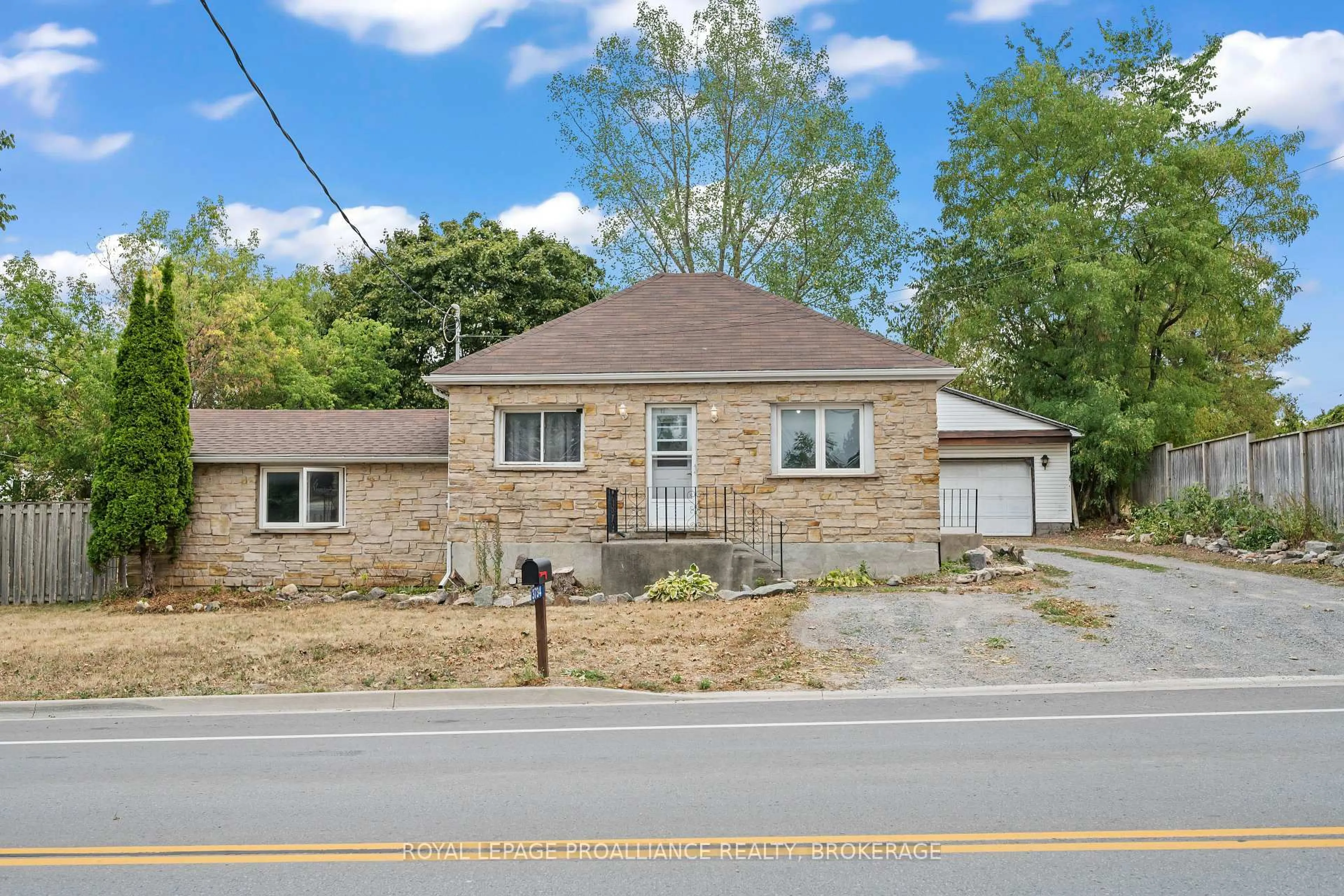 A pic from outside/outdoor area/front of a property/back of a property/a pic from drone, street for 3734 Battersea Rd, Inverary Ontario K0H 1X0