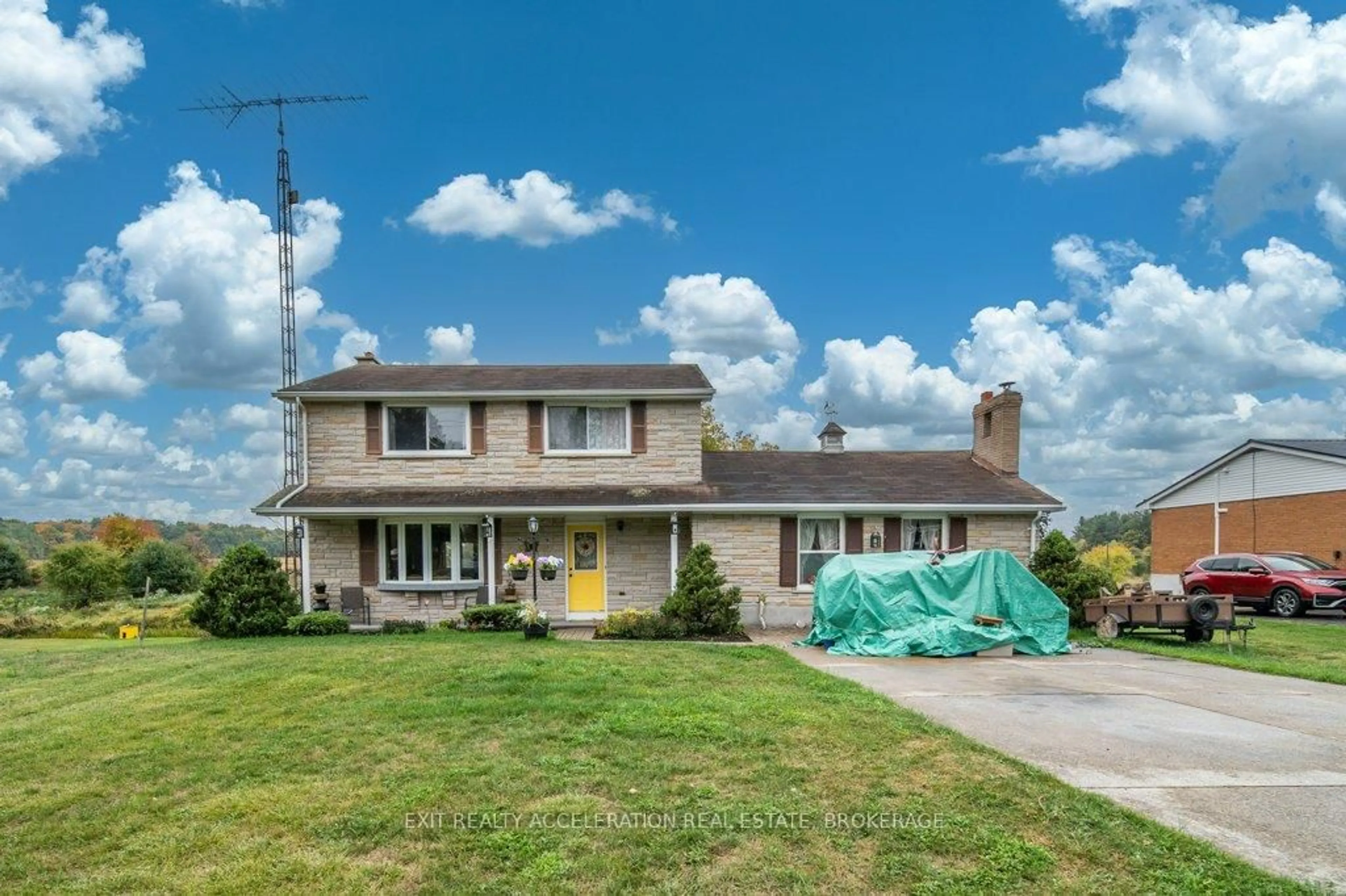 Home with vinyl exterior material, street for 7398 County Rd 2, Napanee Ontario K7R 3K6