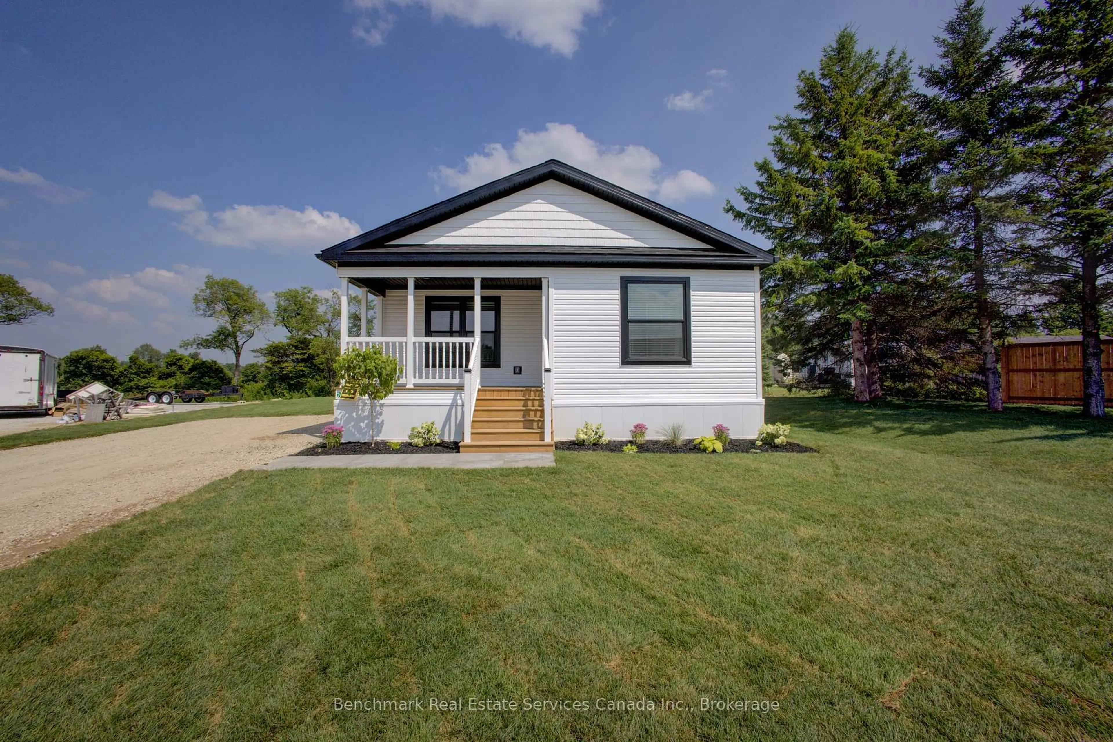 Home with vinyl exterior material, street for 212 SPRUCE Dr, West Grey Ontario N4N 3B8