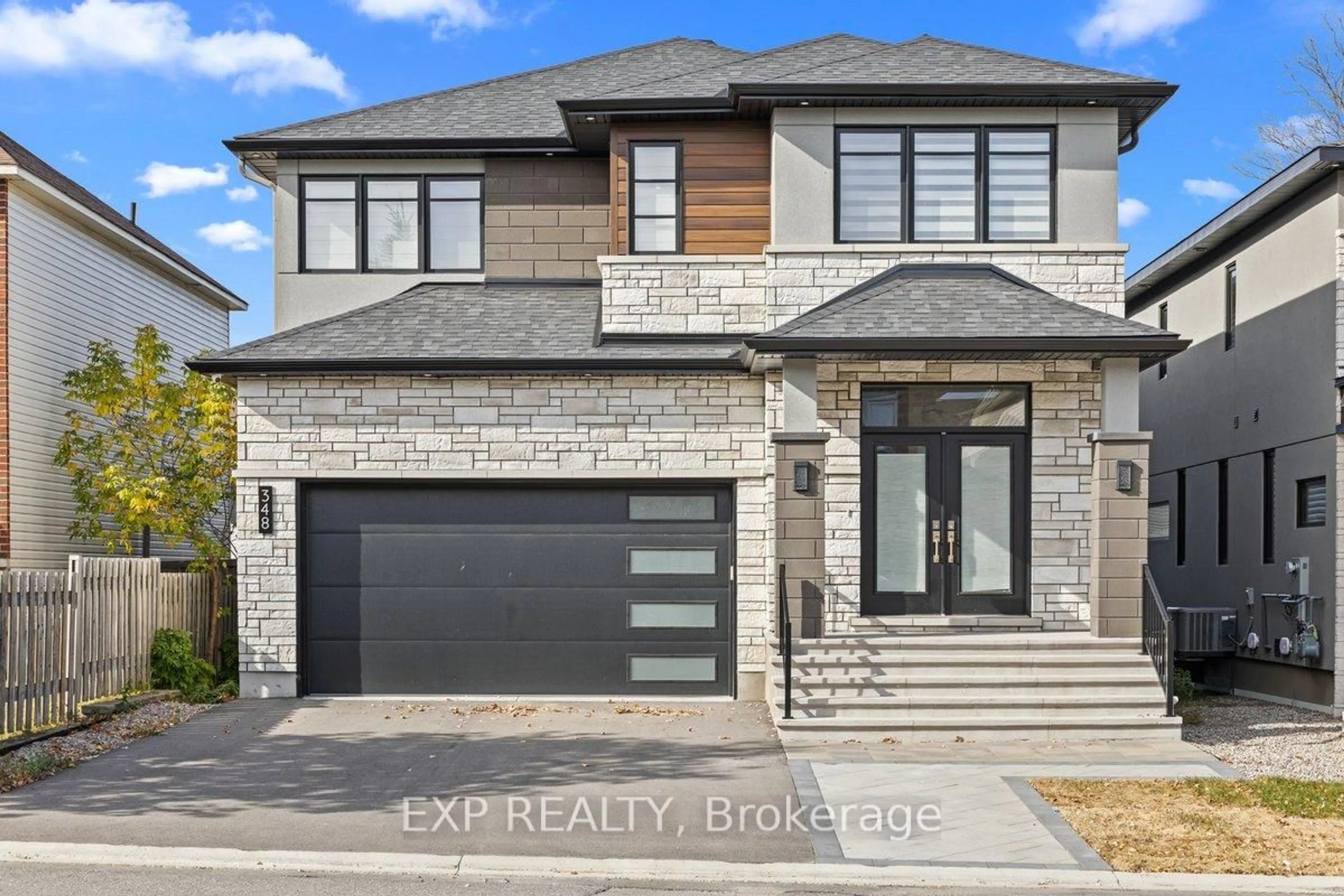 Home with brick exterior material, street for 348 Abbeydale Circ, Ottawa Ontario K2K 0E9