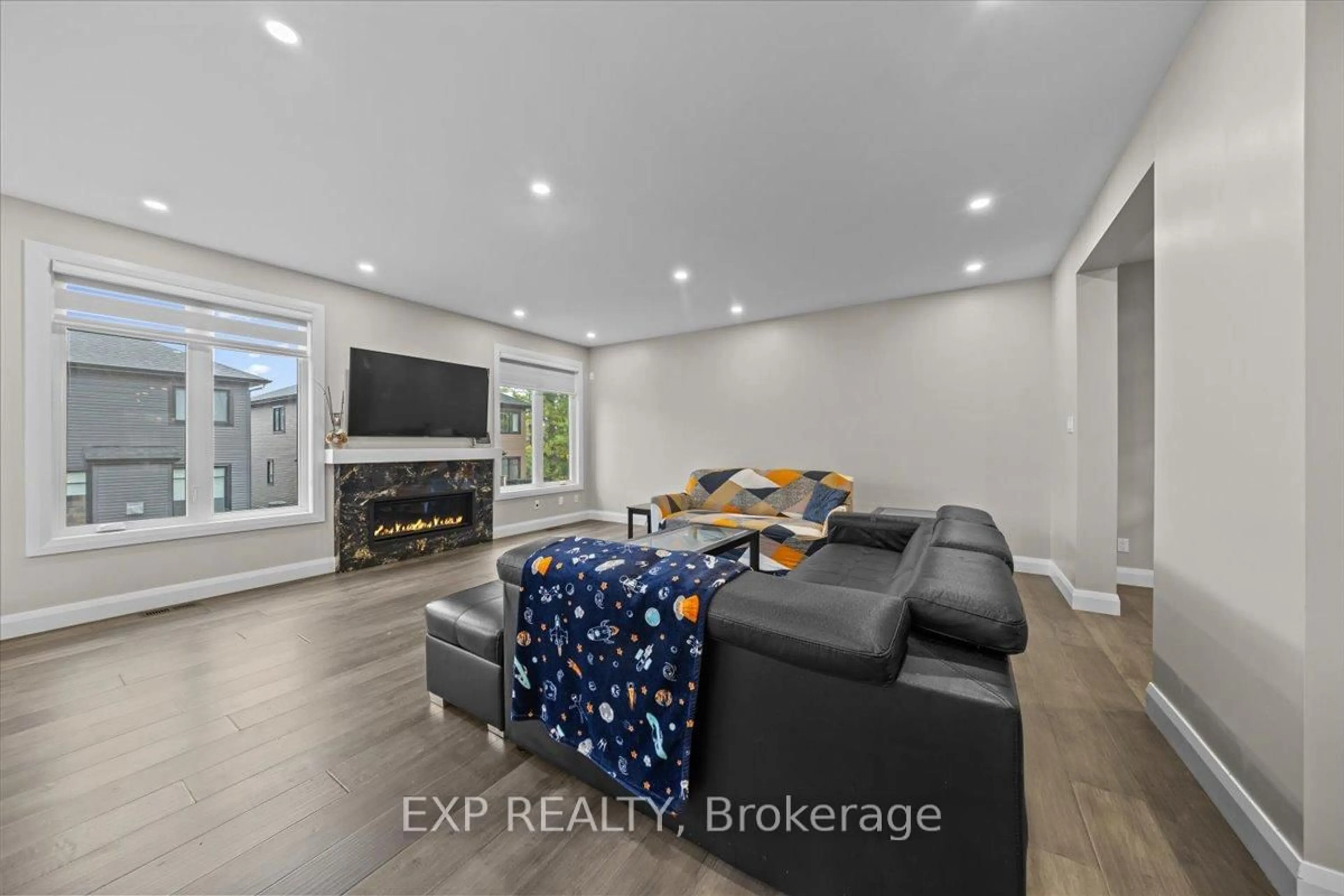 Living room with furniture, ceramic/tile floor for 348 Abbeydale Circ, Ottawa Ontario K2K 0E9